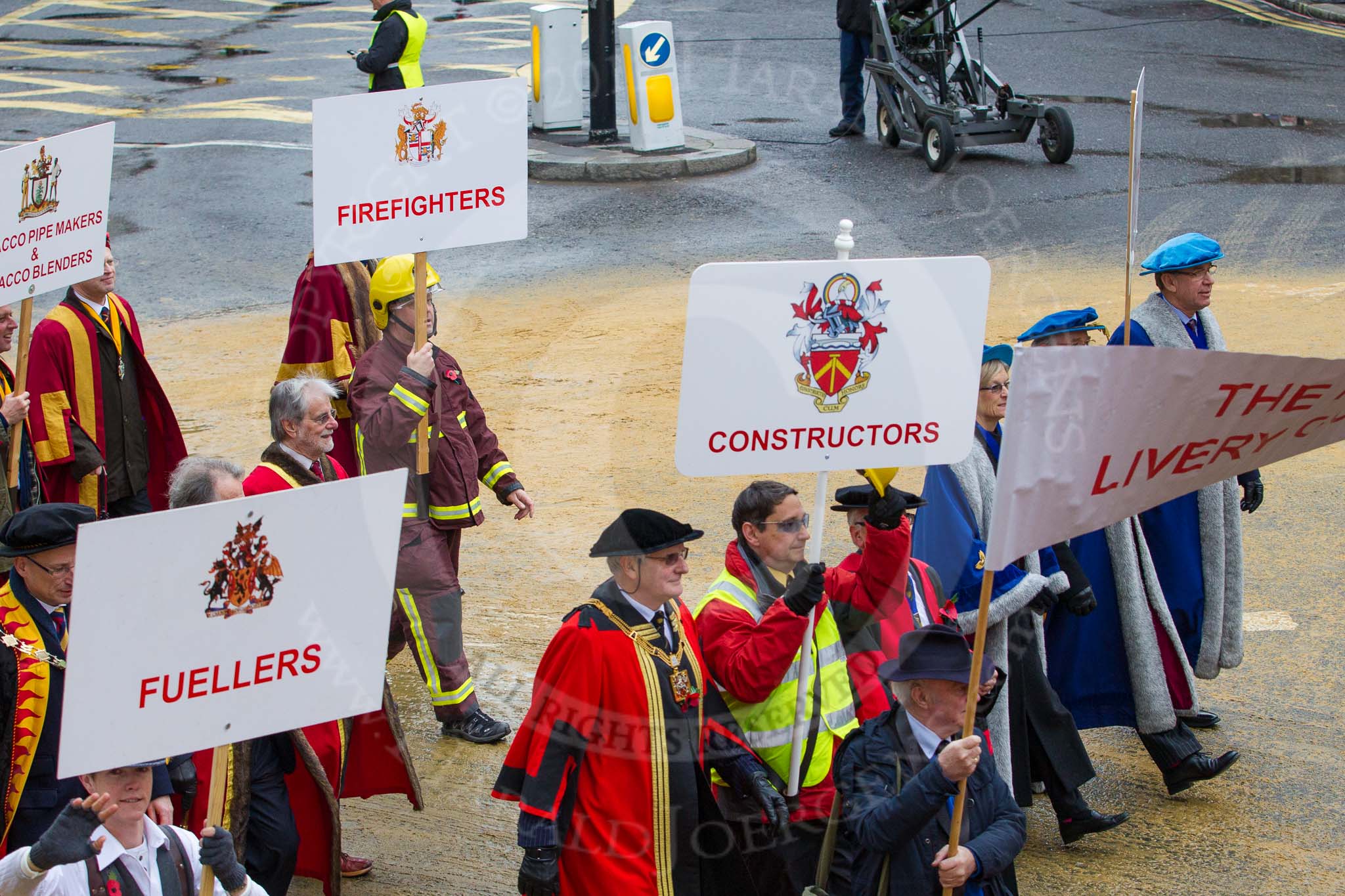 Lord Mayor's Show 2012: Entrry 104 - Modern Livery Companies, representing 26 Livery Companies..
Press stand opposite Mansion House, City of London,
London,
Greater London,
United Kingdom,
on 10 November 2012 at 11:51, image #1414