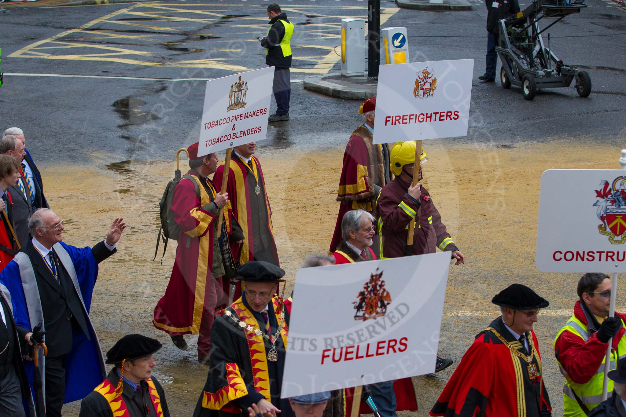 Lord Mayor's Show 2012: Entrry 104 - Modern Livery Companies, representing 26 Livery Companies..
Press stand opposite Mansion House, City of London,
London,
Greater London,
United Kingdom,
on 10 November 2012 at 11:51, image #1415