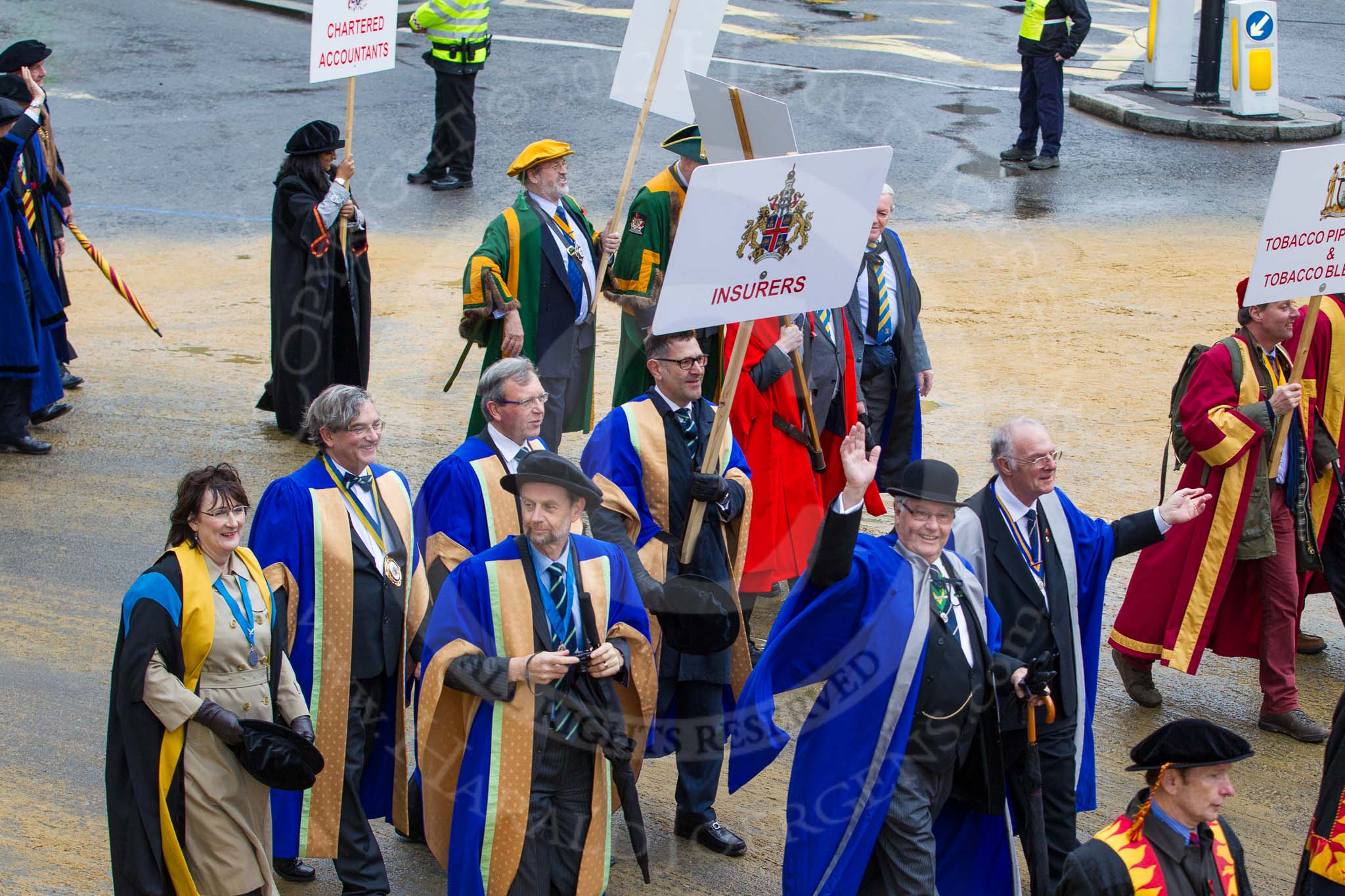 Lord Mayor's Show 2012: Entrry 104 - Modern Livery Companies, representing 26 Livery Companies..
Press stand opposite Mansion House, City of London,
London,
Greater London,
United Kingdom,
on 10 November 2012 at 11:51, image #1419