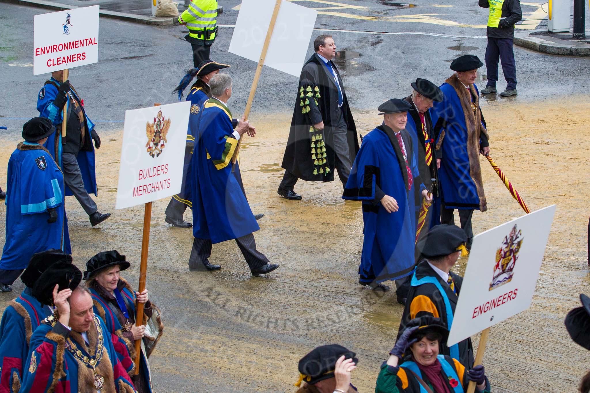 Lord Mayor's Show 2012: Entrry 104 - Modern Livery Companies, representing 26 Livery Companies..
Press stand opposite Mansion House, City of London,
London,
Greater London,
United Kingdom,
on 10 November 2012 at 11:51, image #1422