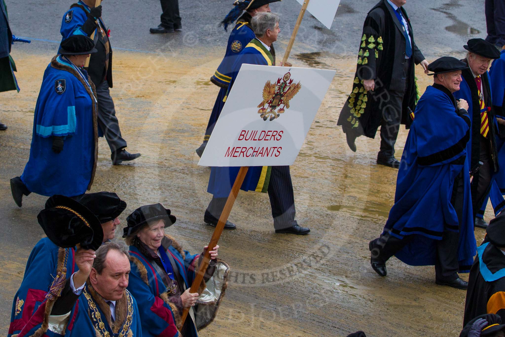 Lord Mayor's Show 2012: Entrry 104 - Modern Livery Companies, representing 26 Livery Companies..
Press stand opposite Mansion House, City of London,
London,
Greater London,
United Kingdom,
on 10 November 2012 at 11:51, image #1423