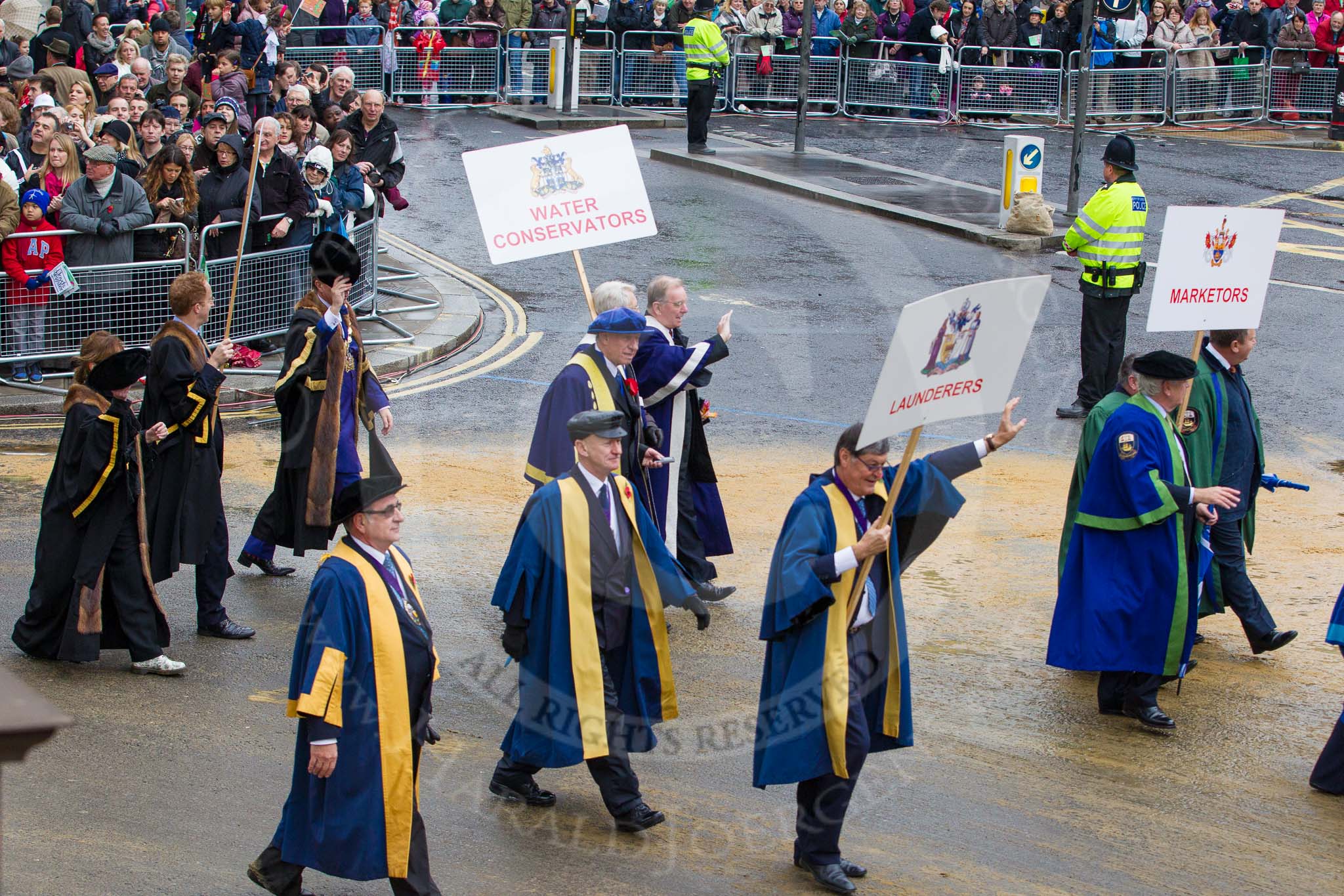 Lord Mayor's Show 2012: Entrry 104 - Modern Livery Companies, representing 26 Livery Companies..
Press stand opposite Mansion House, City of London,
London,
Greater London,
United Kingdom,
on 10 November 2012 at 11:51, image #1425