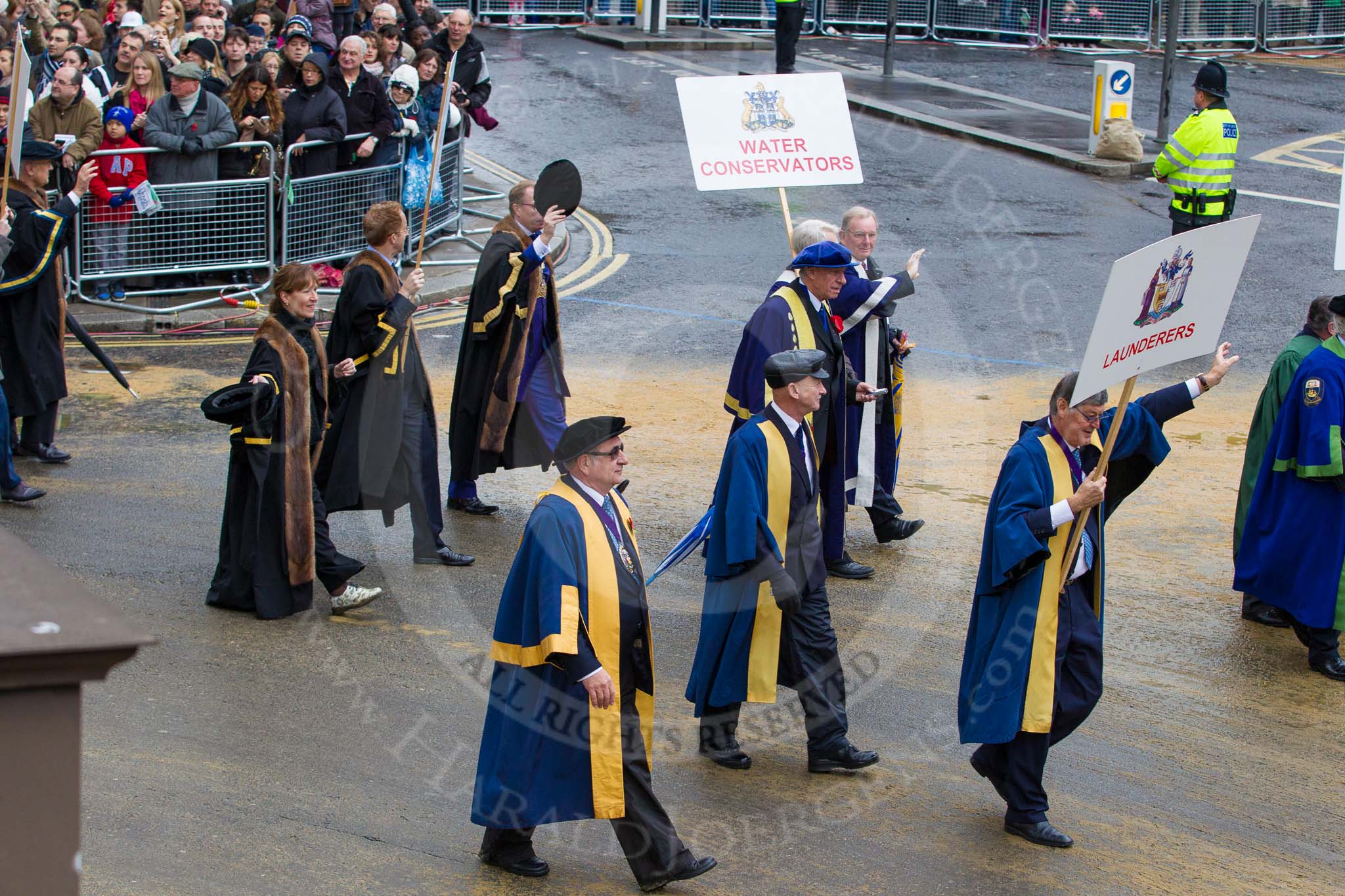 Lord Mayor's Show 2012: Entrry 104 - Modern Livery Companies, representing 26 Livery Companies..
Press stand opposite Mansion House, City of London,
London,
Greater London,
United Kingdom,
on 10 November 2012 at 11:51, image #1426