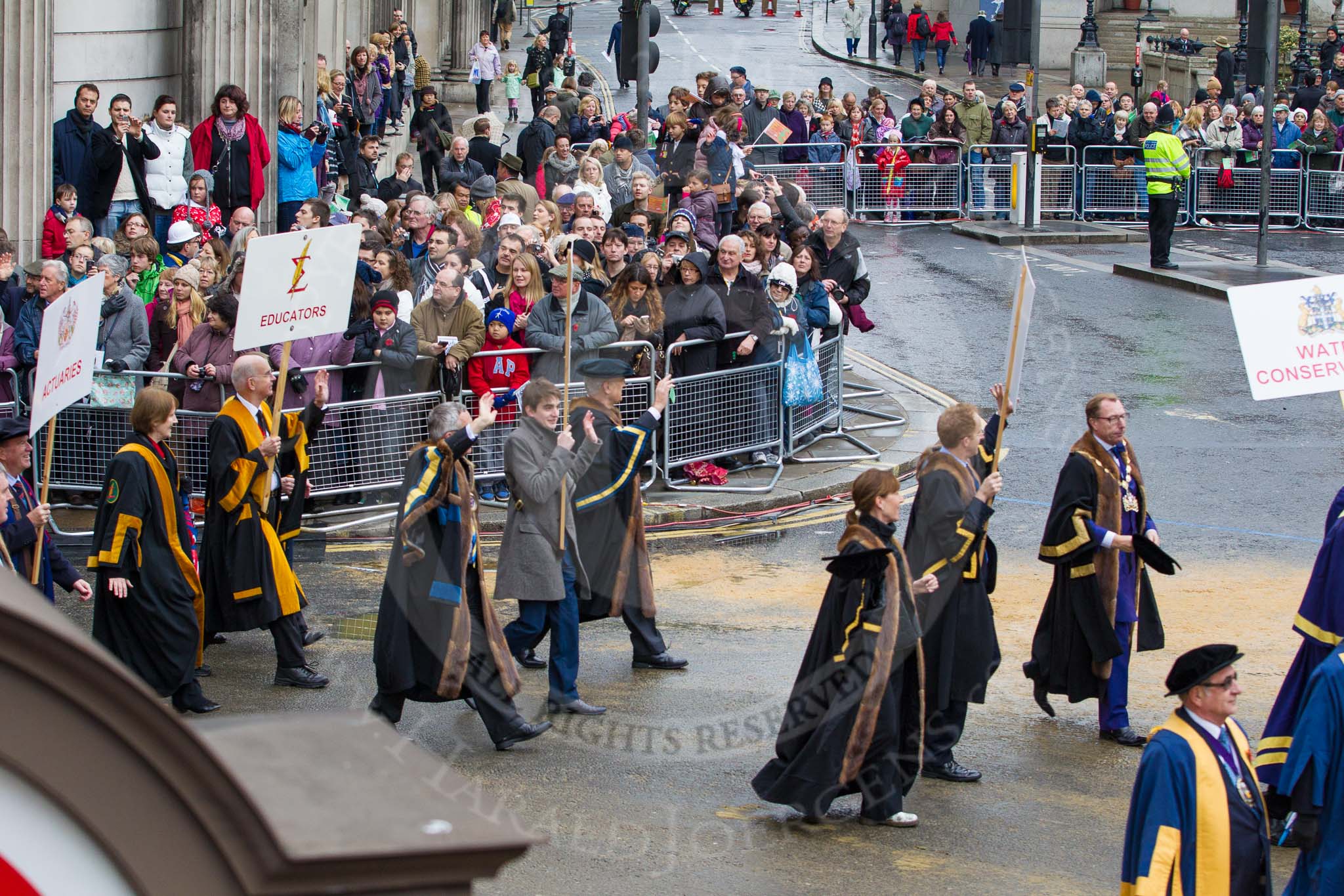 Lord Mayor's Show 2012: Entrry 104 - Modern Livery Companies, representing 26 Livery Companies..
Press stand opposite Mansion House, City of London,
London,
Greater London,
United Kingdom,
on 10 November 2012 at 11:51, image #1427