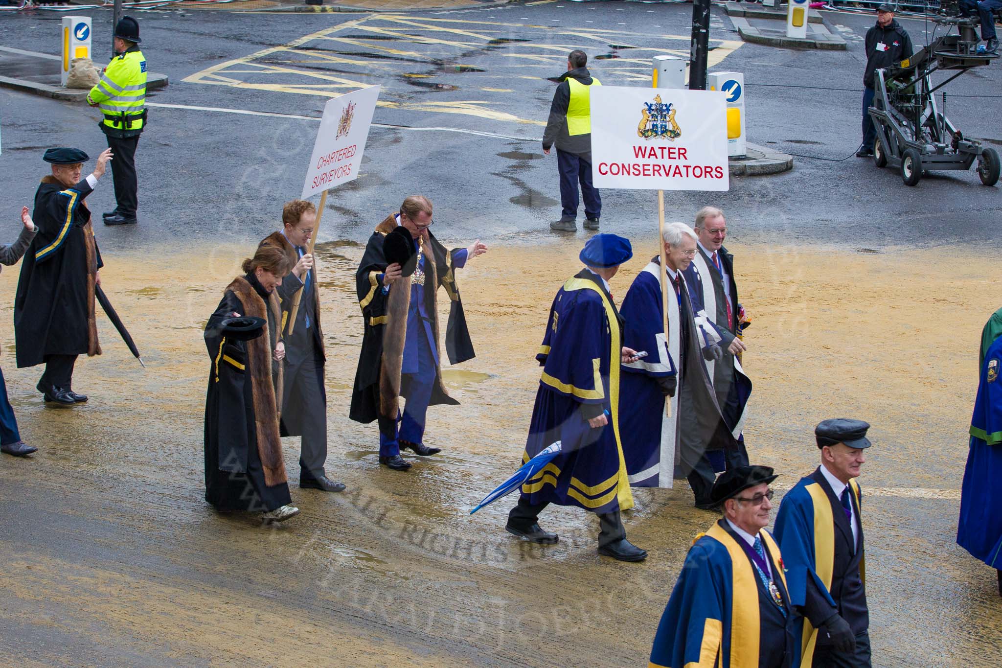 Lord Mayor's Show 2012: Entrry 104 - Modern Livery Companies, representing 26 Livery Companies..
Press stand opposite Mansion House, City of London,
London,
Greater London,
United Kingdom,
on 10 November 2012 at 11:51, image #1429