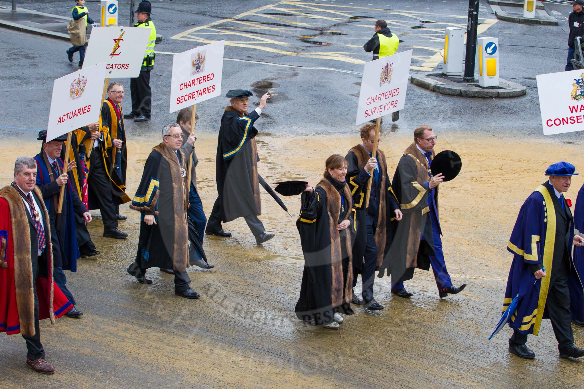 Lord Mayor's Show 2012: Entrry 104 - Modern Livery Companies, representing 26 Livery Companies..
Press stand opposite Mansion House, City of London,
London,
Greater London,
United Kingdom,
on 10 November 2012 at 11:51, image #1431