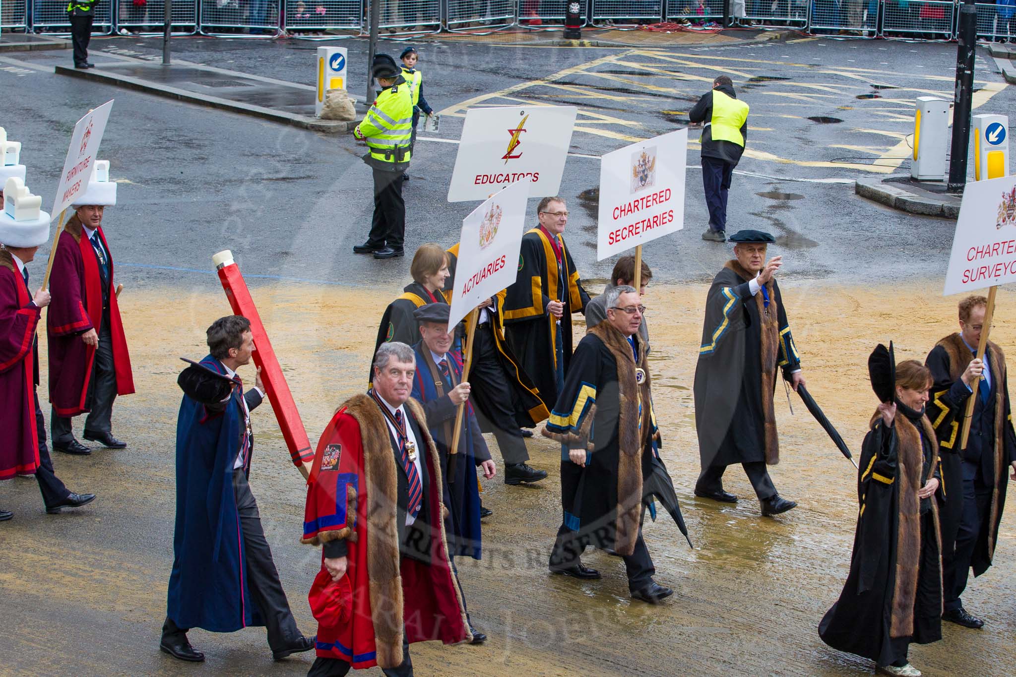 Lord Mayor's Show 2012: Entrry 104 - Modern Livery Companies, representing 26 Livery Companies..
Press stand opposite Mansion House, City of London,
London,
Greater London,
United Kingdom,
on 10 November 2012 at 11:51, image #1432