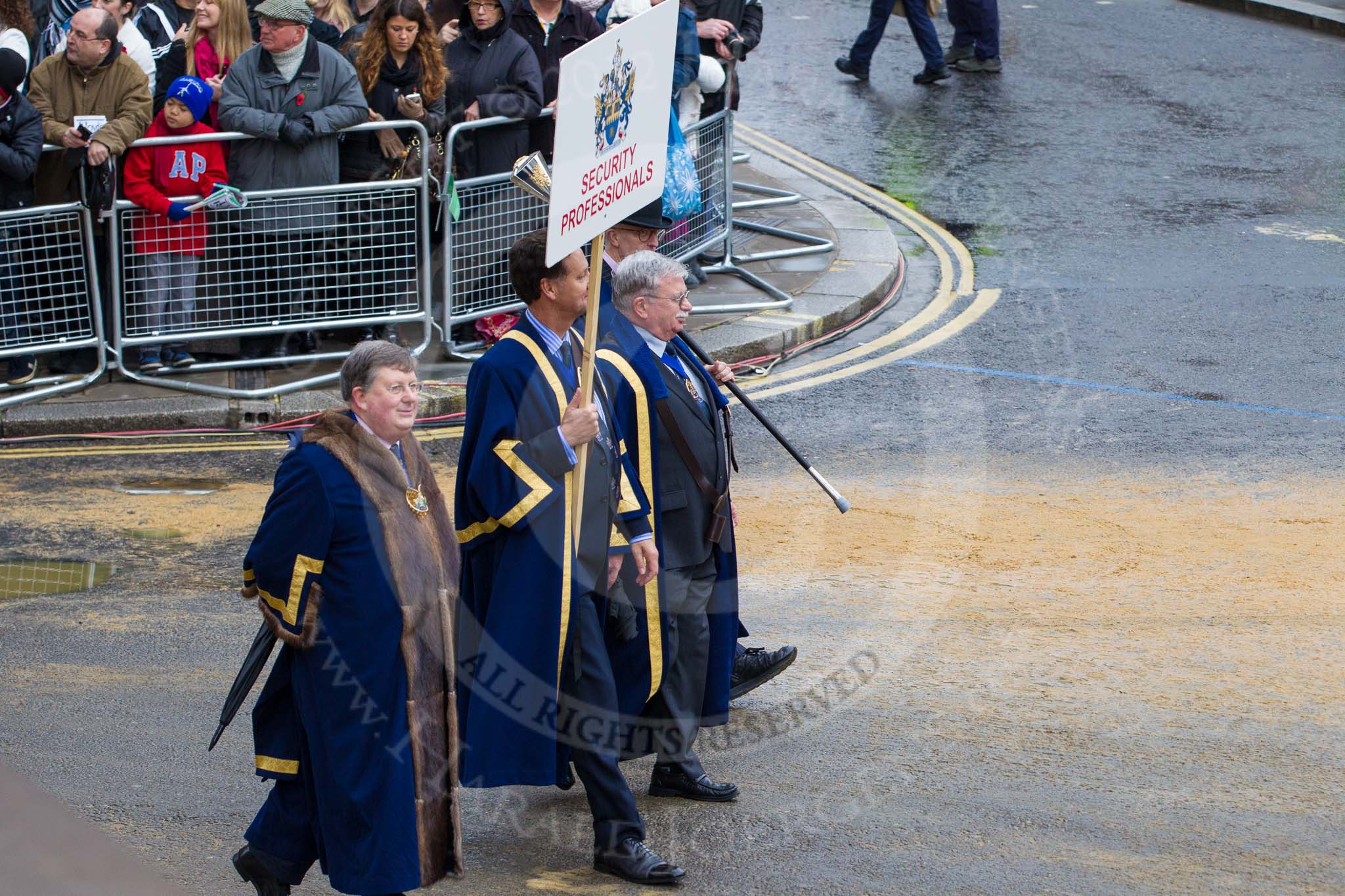 Lord Mayor's Show 2012: Entrry 104 - Modern Livery Companies, representing 26 Livery Companies..
Press stand opposite Mansion House, City of London,
London,
Greater London,
United Kingdom,
on 10 November 2012 at 11:51, image #1444