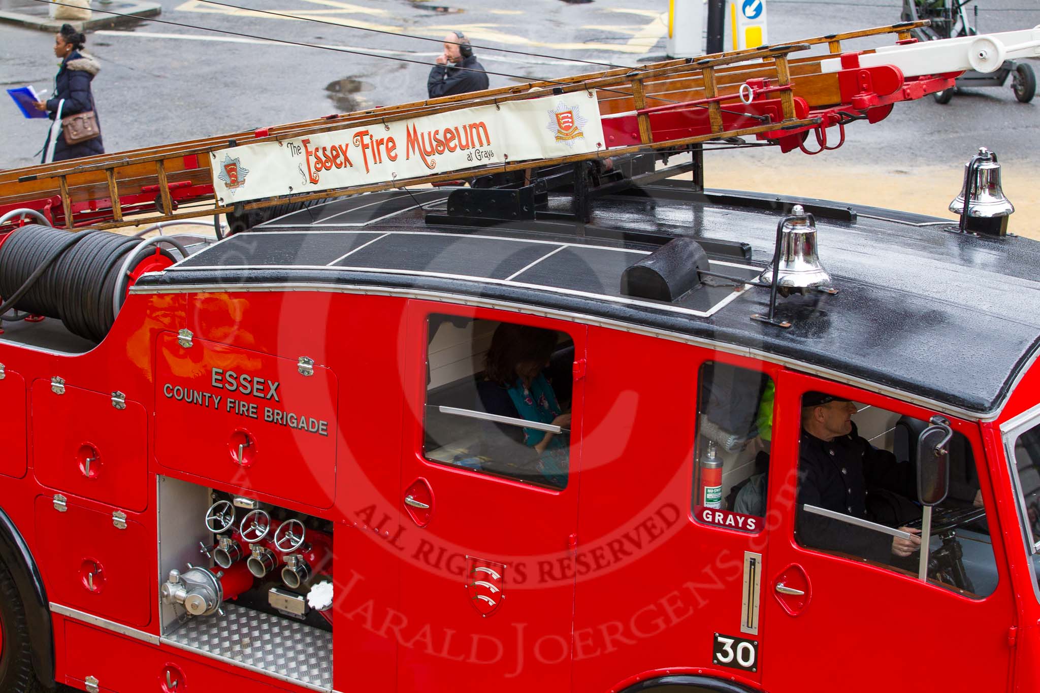 Lord Mayor's Show 2012: Entrry 104 - Modern Livery Companies, representing 26 Livery Companies, here with a historic Dennis fire engine..
Press stand opposite Mansion House, City of London,
London,
Greater London,
United Kingdom,
on 10 November 2012 at 11:52, image #1462