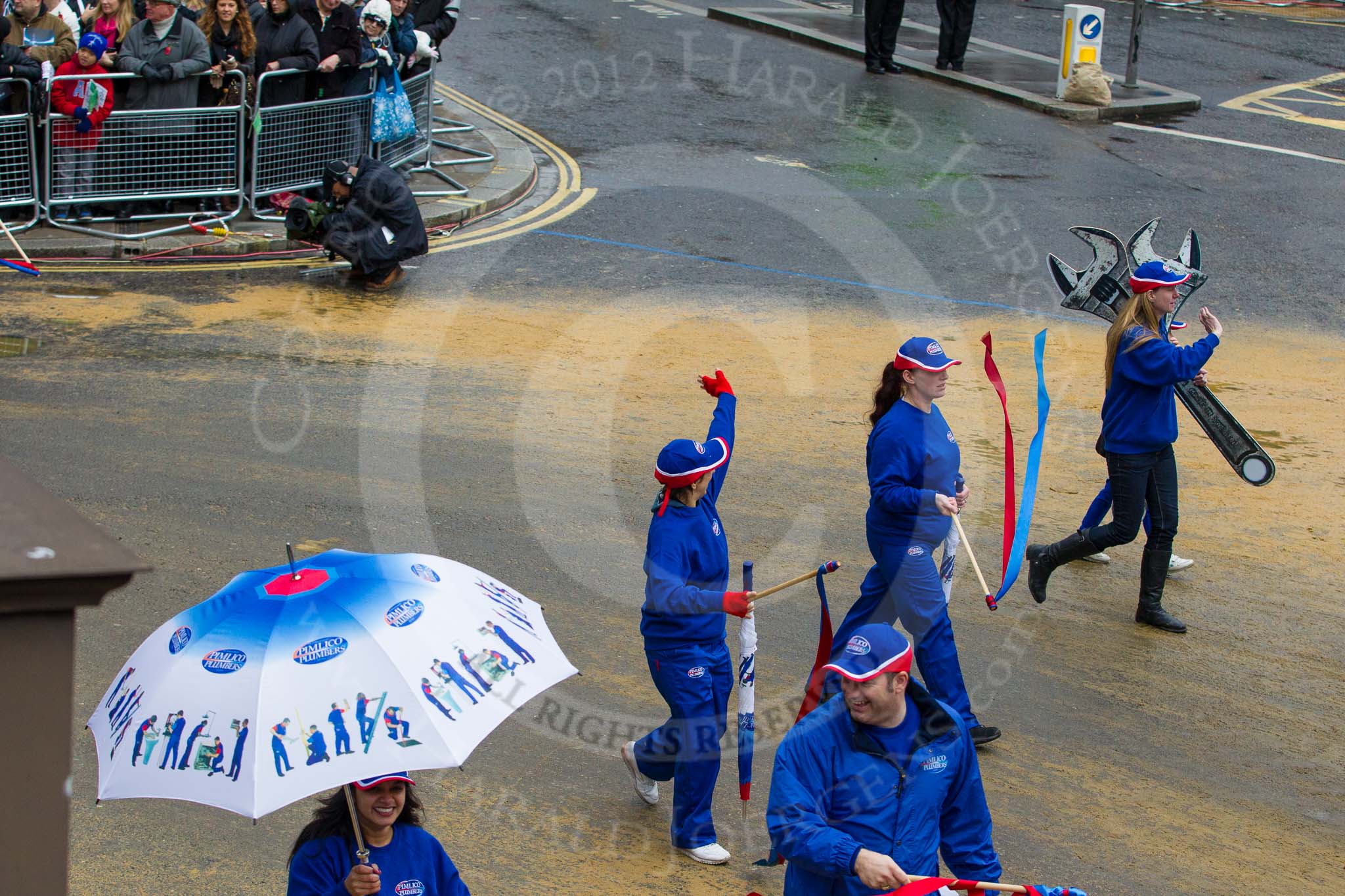 Lord Mayor's Show 2012: Entry 107 - Pimlico Plumbers..
Press stand opposite Mansion House, City of London,
London,
Greater London,
United Kingdom,
on 10 November 2012 at 11:54, image #1531