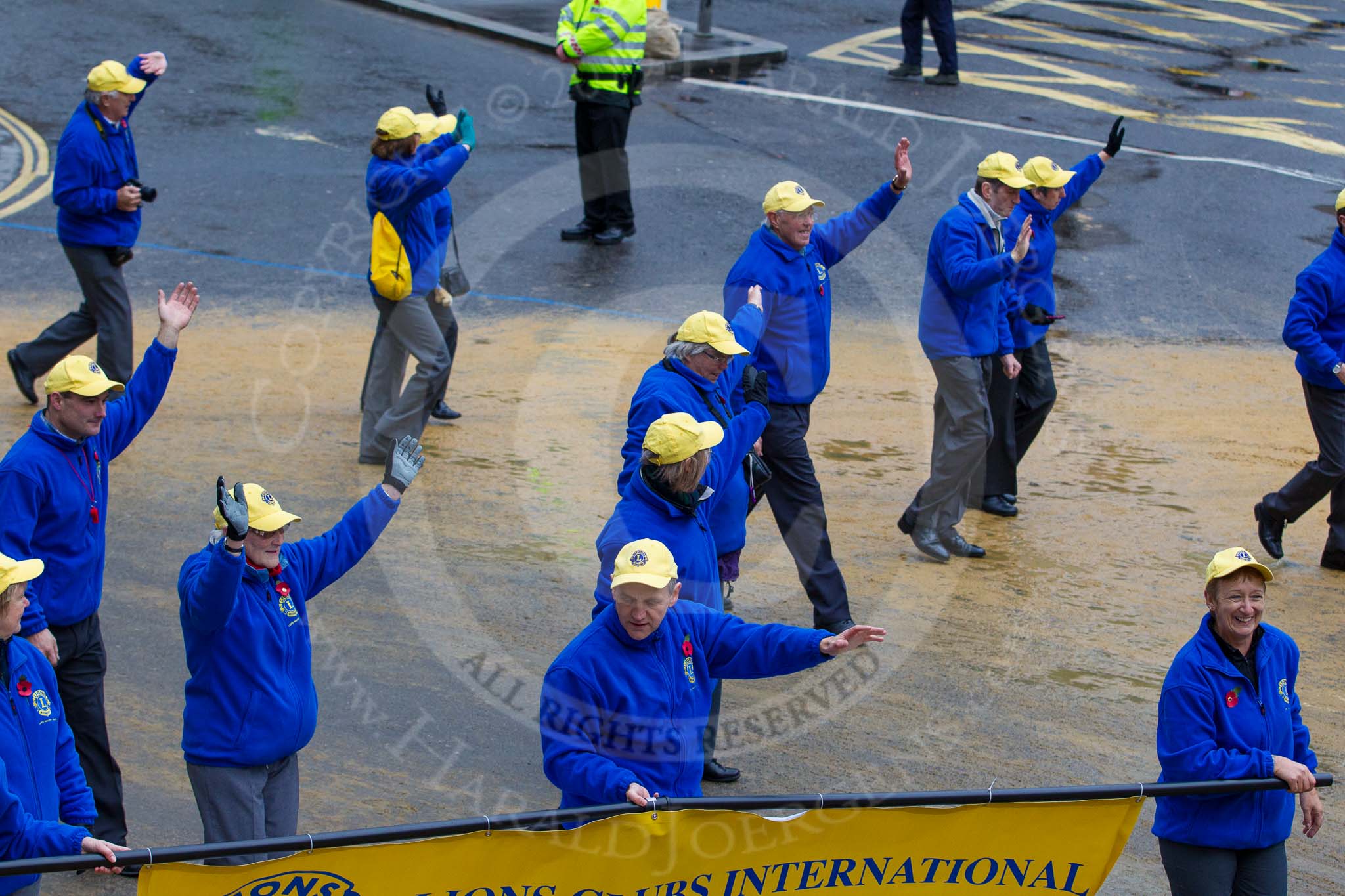 Lord Mayor's Show 2012: Entry 110 - Lions Clubs International..
Press stand opposite Mansion House, City of London,
London,
Greater London,
United Kingdom,
on 10 November 2012 at 11:55, image #1562