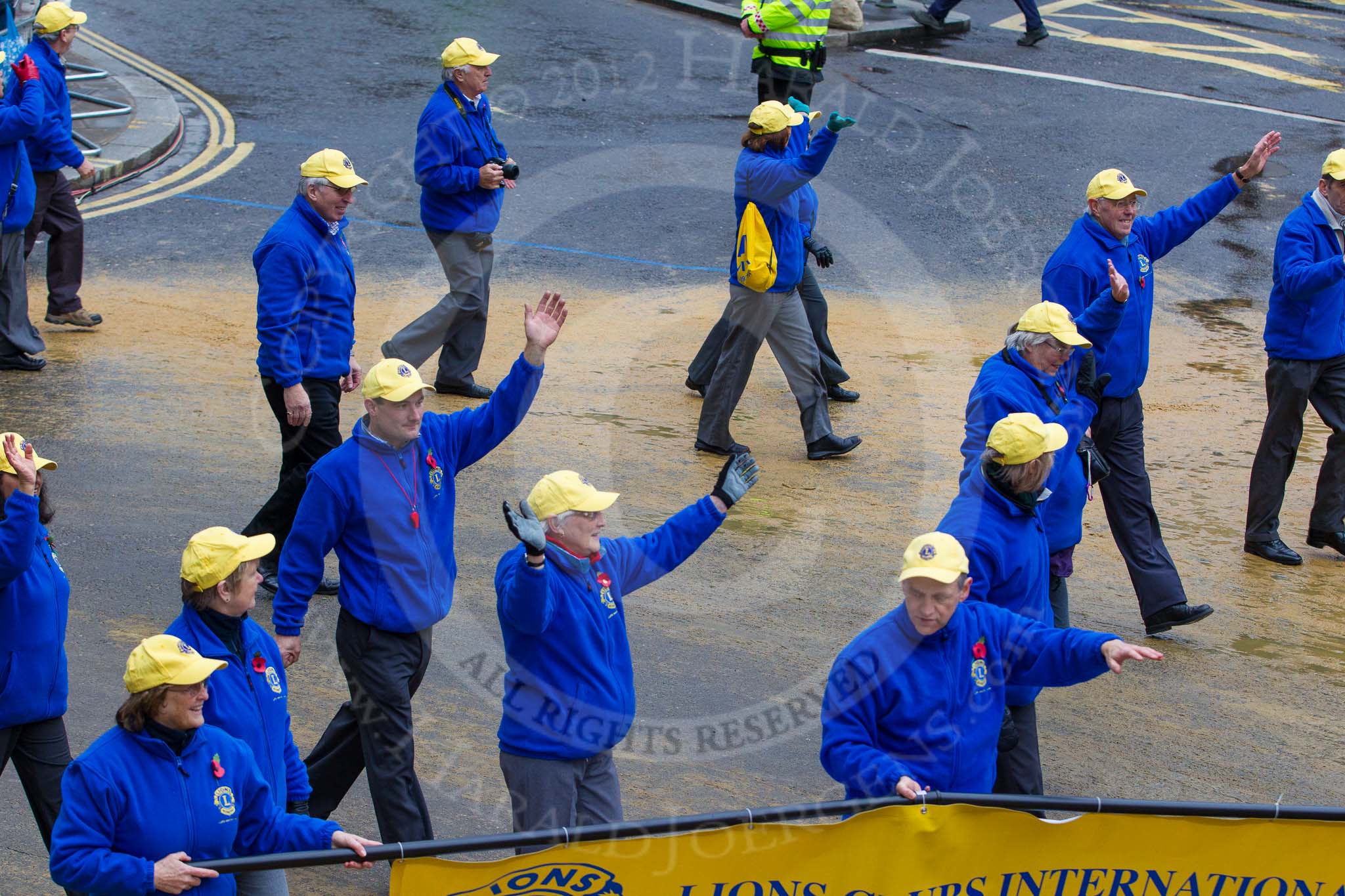 Lord Mayor's Show 2012: Entry 110 - Lions Clubs International..
Press stand opposite Mansion House, City of London,
London,
Greater London,
United Kingdom,
on 10 November 2012 at 11:55, image #1563