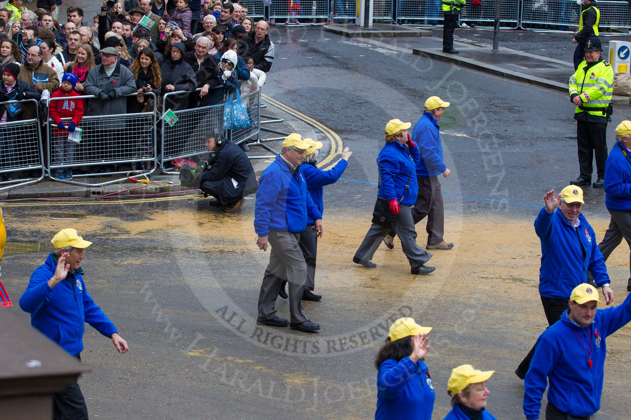 Lord Mayor's Show 2012: Entry 110 - Lions Clubs International..
Press stand opposite Mansion House, City of London,
London,
Greater London,
United Kingdom,
on 10 November 2012 at 11:55, image #1565