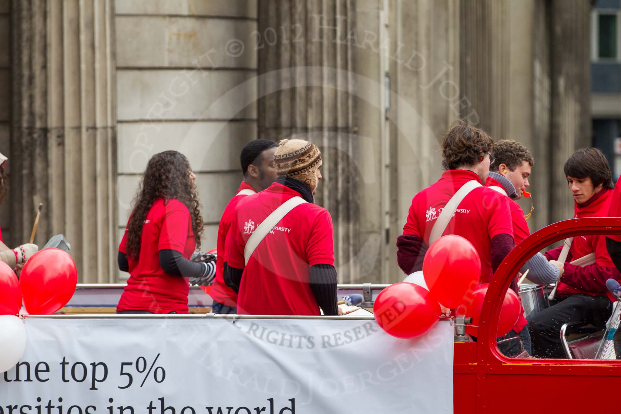 Lord Mayor's Show 2012: Entry 113 - City University London..
Press stand opposite Mansion House, City of London,
London,
Greater London,
United Kingdom,
on 10 November 2012 at 11:57, image #1636