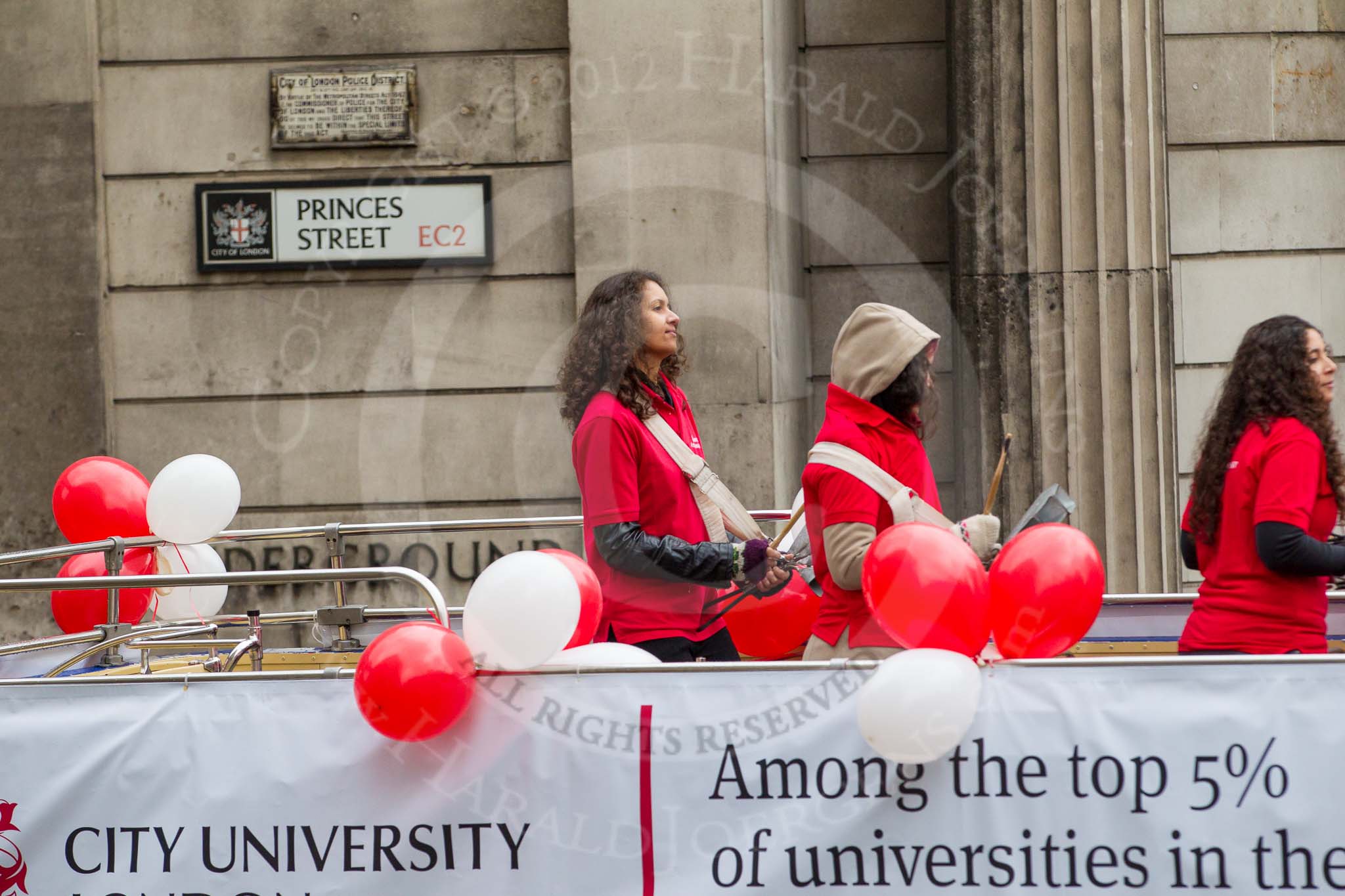 Lord Mayor's Show 2012: Entry 113 - City University London..
Press stand opposite Mansion House, City of London,
London,
Greater London,
United Kingdom,
on 10 November 2012 at 11:57, image #1637