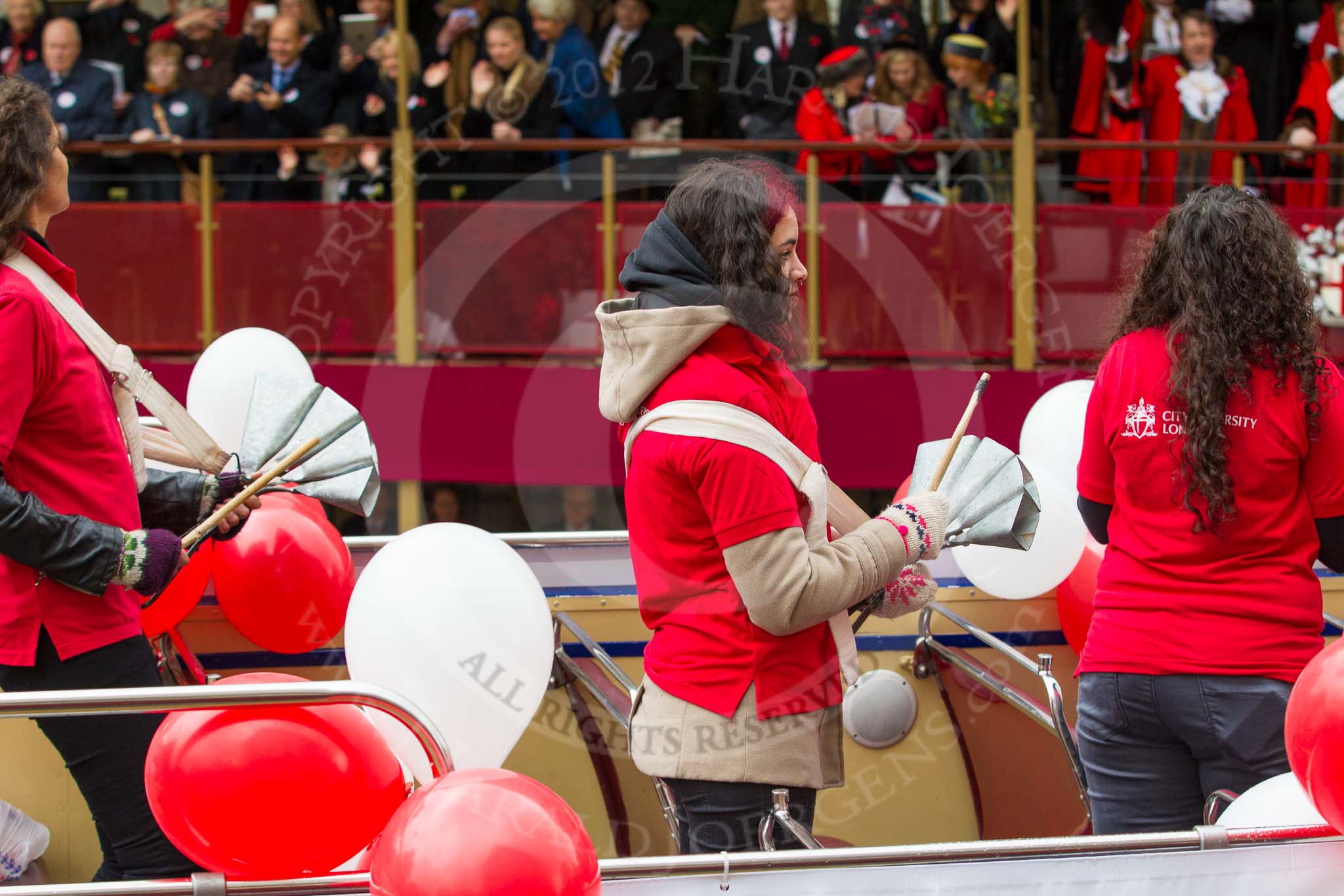 Lord Mayor's Show 2012: Entry 113 - City University London..
Press stand opposite Mansion House, City of London,
London,
Greater London,
United Kingdom,
on 10 November 2012 at 11:58, image #1655