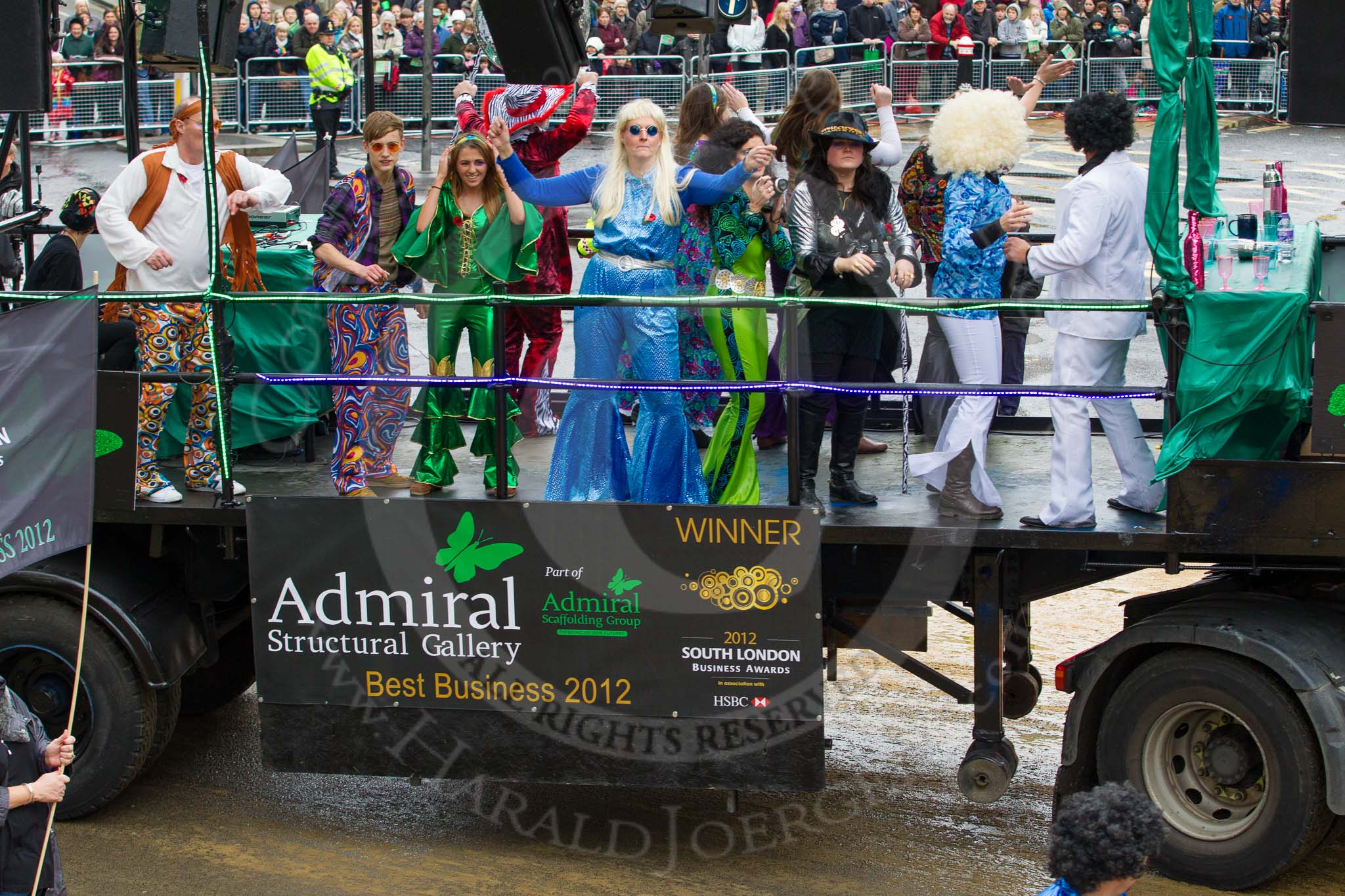 Lord Mayor's Show 2012: Entry 119 - Admiral Scaffolding..
Press stand opposite Mansion House, City of London,
London,
Greater London,
United Kingdom,
on 10 November 2012 at 12:00, image #1697