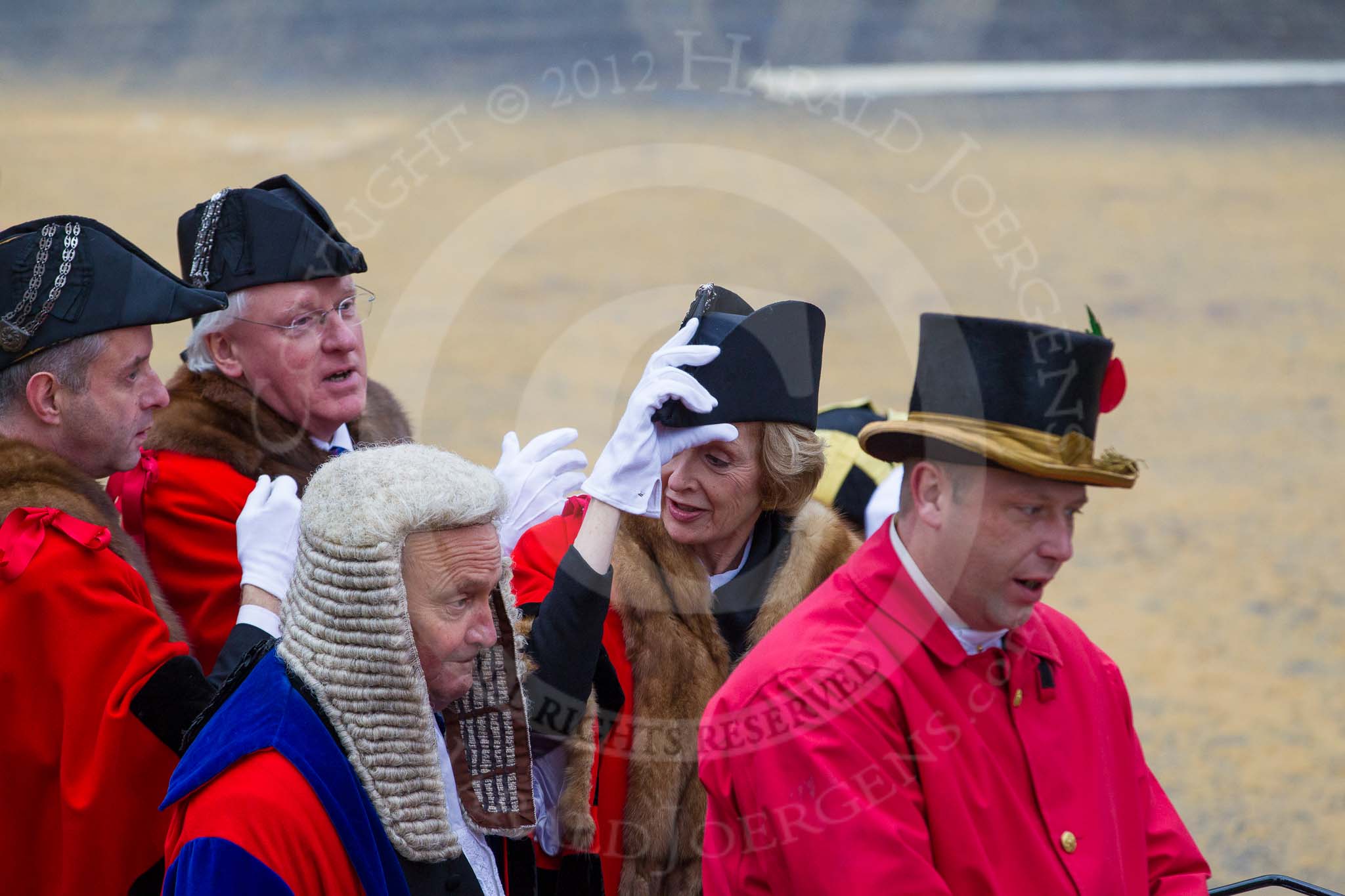 Photo 1211101205451D48347HaraldJoergens Lord Mayor's Show 2012: Entry136 - Recorder and Aldermen below the Chair. Dr Alndrew Parmley, Simon Walsh, Fiona Woolf CBE, and Judge Peter Beaumont QC..
Press stand opposite Mansion House, City of London,
London,
Greater London,
United Kingdom,
on 10 November 2012 at 12:05, image #1867