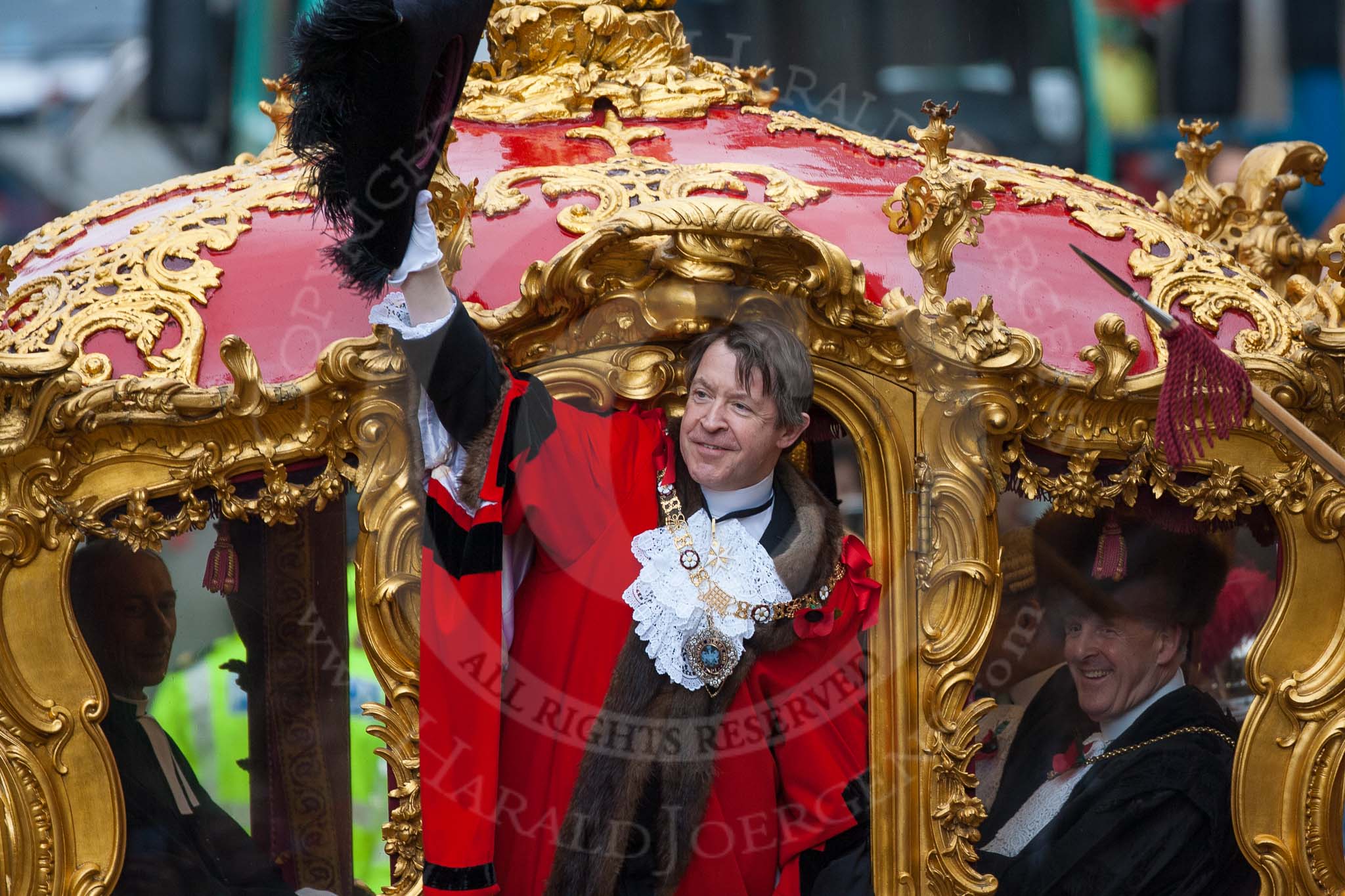 Lord Mayor's Show 2012: Lord Mayor Roger Gifford waving from his carriage as he is about to leave for St Paul's Cathedral..
Press stand opposite Mansion House, City of London,
London,
Greater London,
United Kingdom,
on 10 November 2012 at 12:12, image #1952