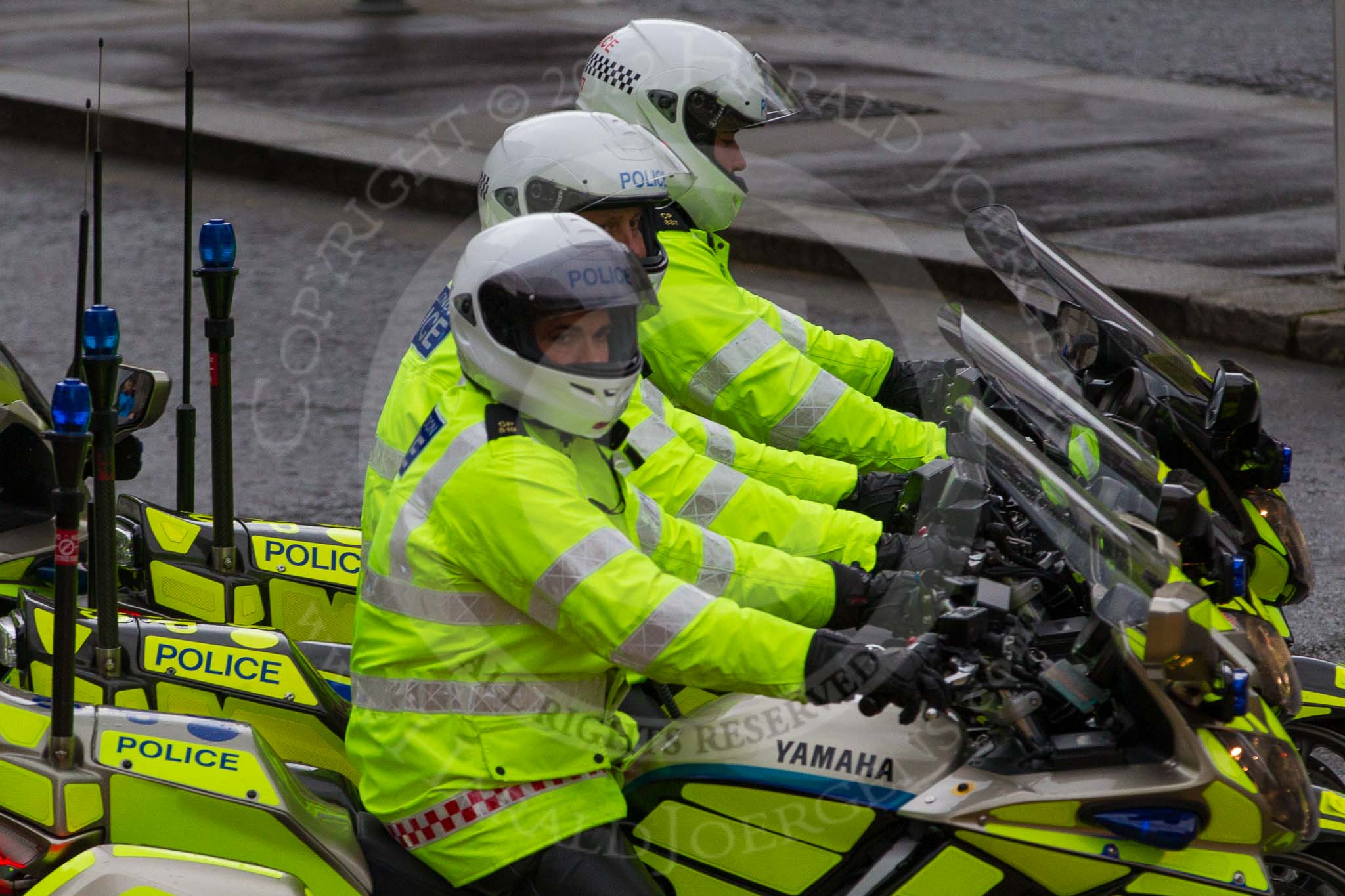 Lord Mayor's Show 2012: An almost perfect lineup of three Metropolitan Police Yamaha motorbikes..
Press stand opposite Mansion House, City of London,
London,
Greater London,
United Kingdom,
on 10 November 2012 at 12:13, image #1955