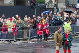 Lord Mayor's Show 2012: Spectators watching the event in front of Banks underground station..
Press stand opposite Mansion House, City of London,
London,
Greater London,
United Kingdom,
on 10 November 2012 at 11:15, image #548