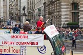 Lord Mayor's Show 2012: Entrry 104 - Modern Livery Companies, representing 26 Livery Companies..
Press stand opposite Mansion House, City of London,
London,
Greater London,
United Kingdom,
on 10 November 2012 at 11:50, image #1404