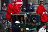 Lord Mayor's Show 2012: Entry 142 - Late Lord Mayor, Alderman and Mrs David Wootton, with the Chaplain Andrew Walker, escorted by four Yeoman Warders and cadets of 1475 (Dulwich) Squadron. Two Dogget's Coat and Badge men stand on the rear of the carriage..
Press stand opposite Mansion House, City of London,
London,
Greater London,
United Kingdom,
on 10 November 2012 at 12:07, image #1904