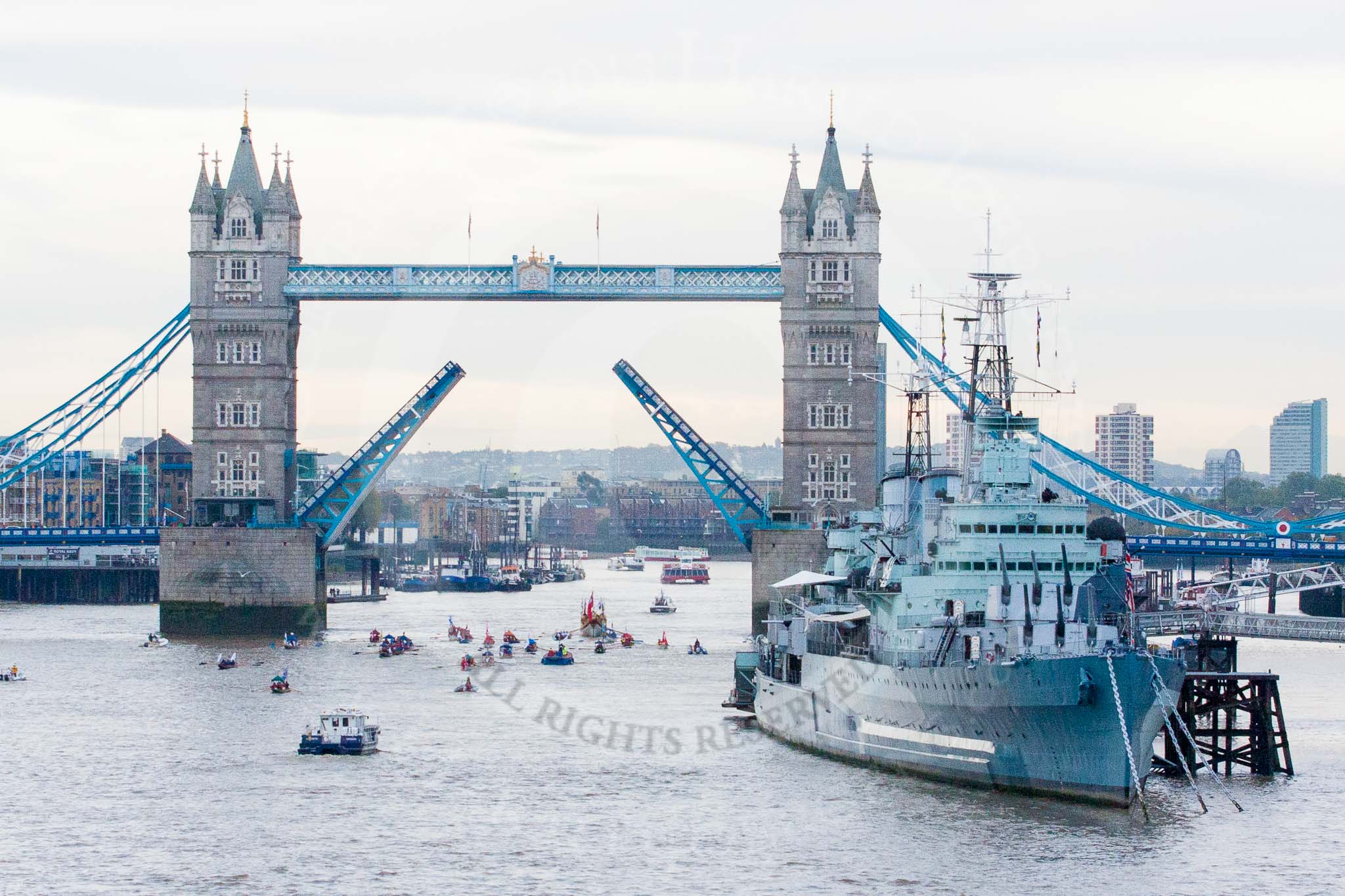 Lord Mayor's Show 2013: The Lord Mayor's flotilla at Tower Bridge, the bridge raised in honour of the Lord Mayor, who's also Admiral of the Port of London. On the right HMS Belfast. Photo: Mike Garland..




on 09 November 2013 at 09:24, image #46