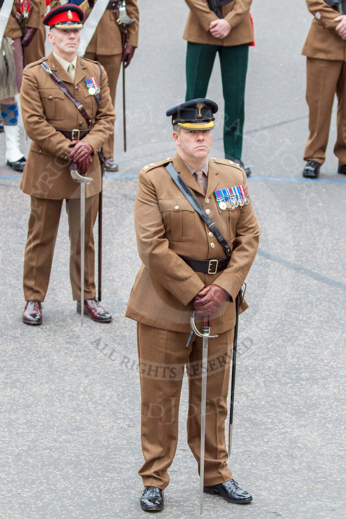 Lord Mayor's Show 2013: The London Regiment, Guard of Honour for the Lord Mayor: The Commanding Officer, Lieutenant Colonel Rupert Pim, and behind him Major Ian Buchanan..
Press stand opposite Mansion House, City of London,
London,
Greater London,
United Kingdom,
on 09 November 2013 at 10:28, image #66