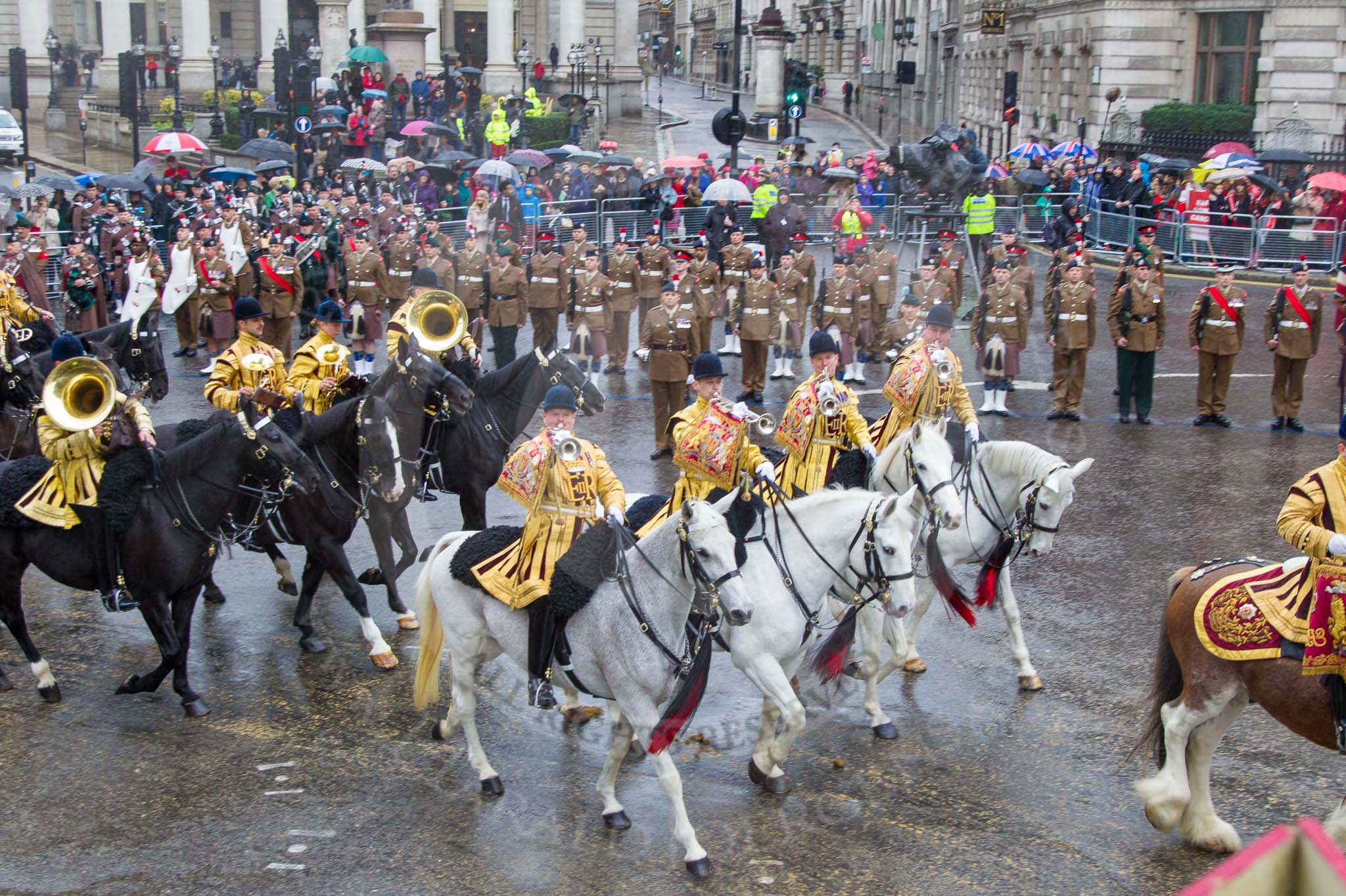 Lord Mayor's Show 2013: The Mounted Band of the Household Cavalry. Behind them The London Regiment, Guard of Honour for the Lord Mayor..
Press stand opposite Mansion House, City of London,
London,
Greater London,
United Kingdom,
on 09 November 2013 at 10:48, image #86