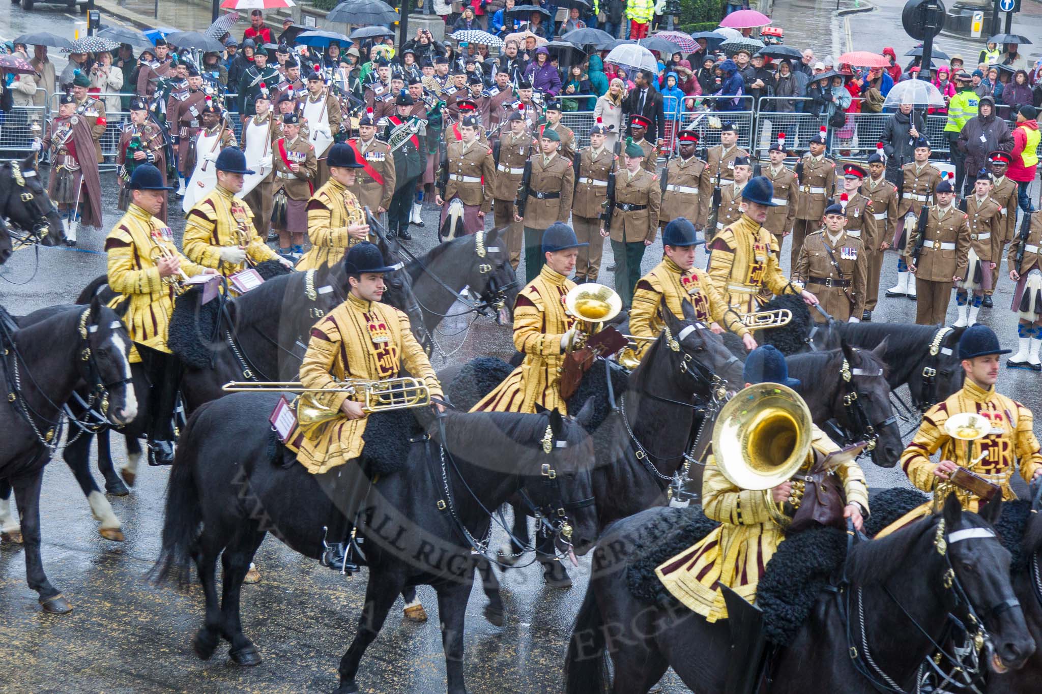 Lord Mayor's Show 2013: The Mounted Band of the Household Cavalry. Behind them The London Regiment, Guard of Honour for the Lord Mayor..
Press stand opposite Mansion House, City of London,
London,
Greater London,
United Kingdom,
on 09 November 2013 at 10:48, image #87