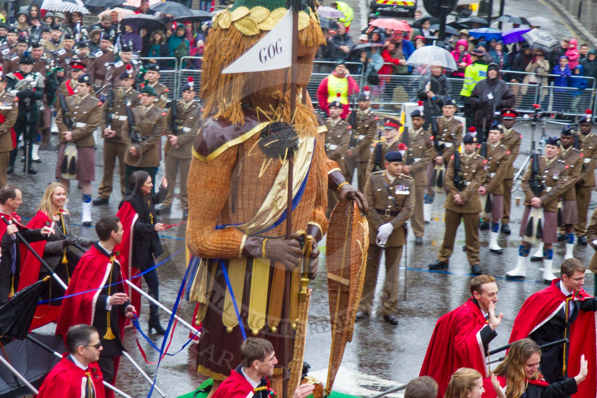 Lord Mayor's Show 2013: 7-Society of Young Freemen, escorts the figures of God and Magog, traditional guardians of London..
Press stand opposite Mansion House, City of London,
London,
Greater London,
United Kingdom,
on 09 November 2013 at 11:03, image #190