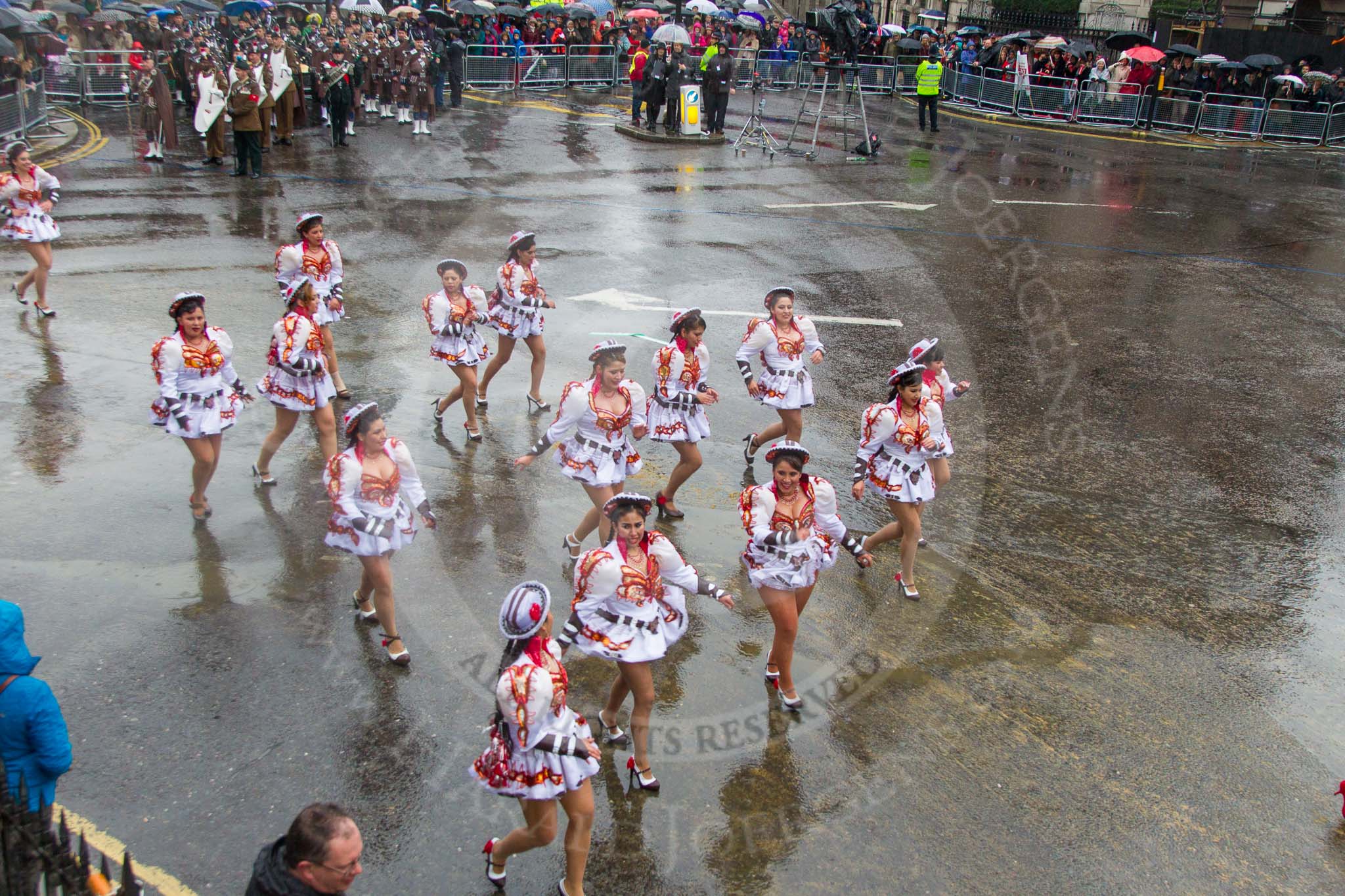 Lord Mayor's Show 2013: 20-Coporales San Simon Londres-community group that promotes Bolivian culture and folklore through performing traditional 'Caporales' dance..
Press stand opposite Mansion House, City of London,
London,
Greater London,
United Kingdom,
on 09 November 2013 at 11:10, image #319