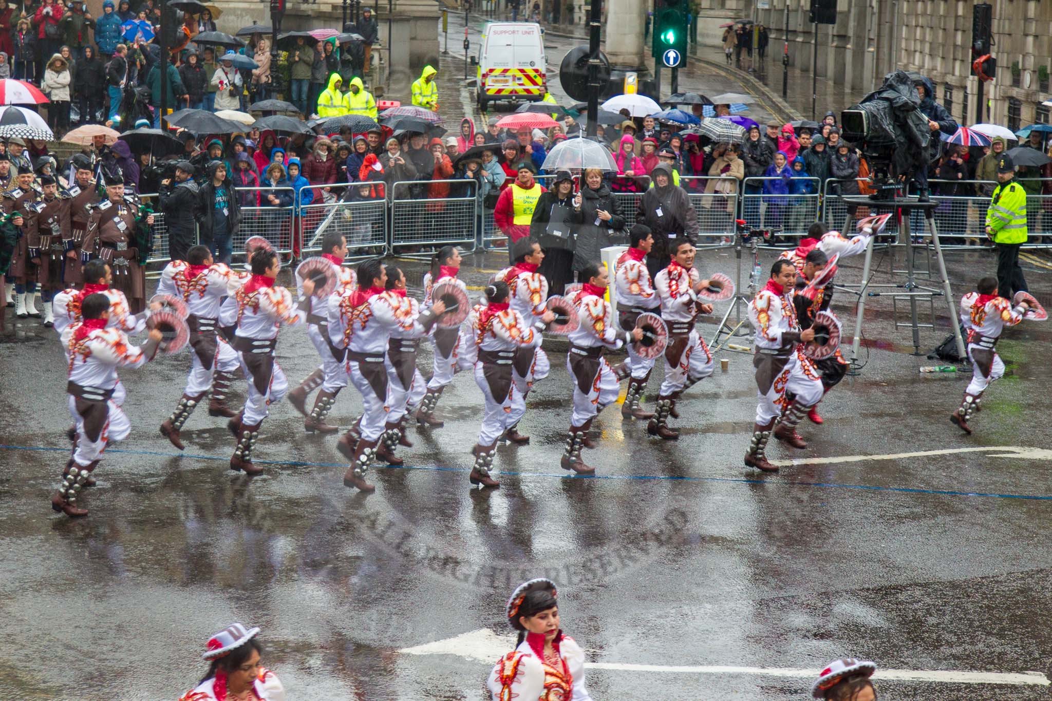 Lord Mayor's Show 2013: 20-Coporales San Simon Londres-community group that promotes Bolivian culture and folklore through performing traditional 'Caporales' dance..
Press stand opposite Mansion House, City of London,
London,
Greater London,
United Kingdom,
on 09 November 2013 at 11:10, image #322