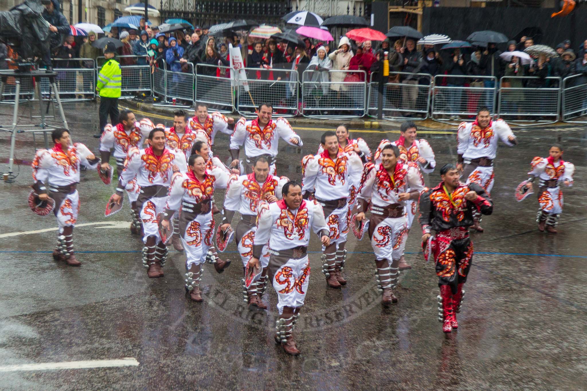 Lord Mayor's Show 2013: 20-Coporales San Simon Londres-community group that promotes Bolivian culture and folklore through performing traditional 'Caporales' dance..
Press stand opposite Mansion House, City of London,
London,
Greater London,
United Kingdom,
on 09 November 2013 at 11:10, image #324