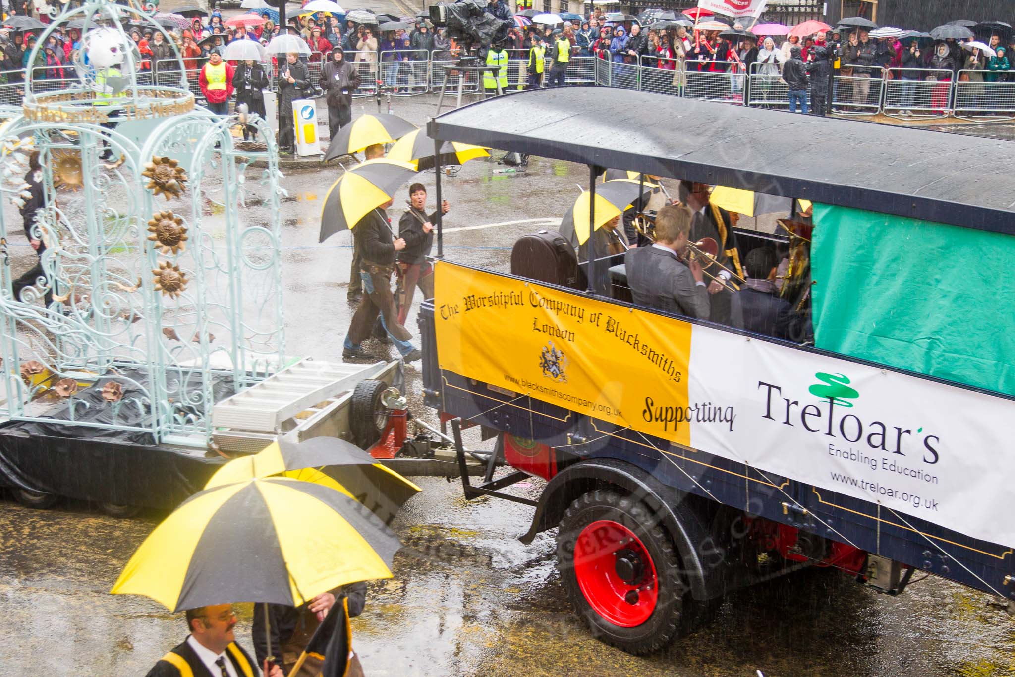 Lord Mayor's Show 2013: 33-Worshipful Company of Blacksmiths-since 1299 Company has supported and promoted the craft of blacksmithings..
Press stand opposite Mansion House, City of London,
London,
Greater London,
United Kingdom,
on 09 November 2013 at 11:17, image #437