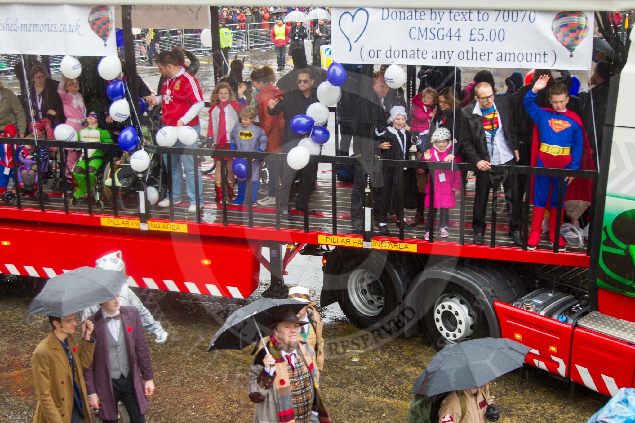 Lord Mayor's Show 2013: 34-Cherished Memories-organises high-profile days of family bonding for life-limited and disabled children from hospicesin South-East England..
Press stand opposite Mansion House, City of London,
London,
Greater London,
United Kingdom,
on 09 November 2013 at 11:18, image #442