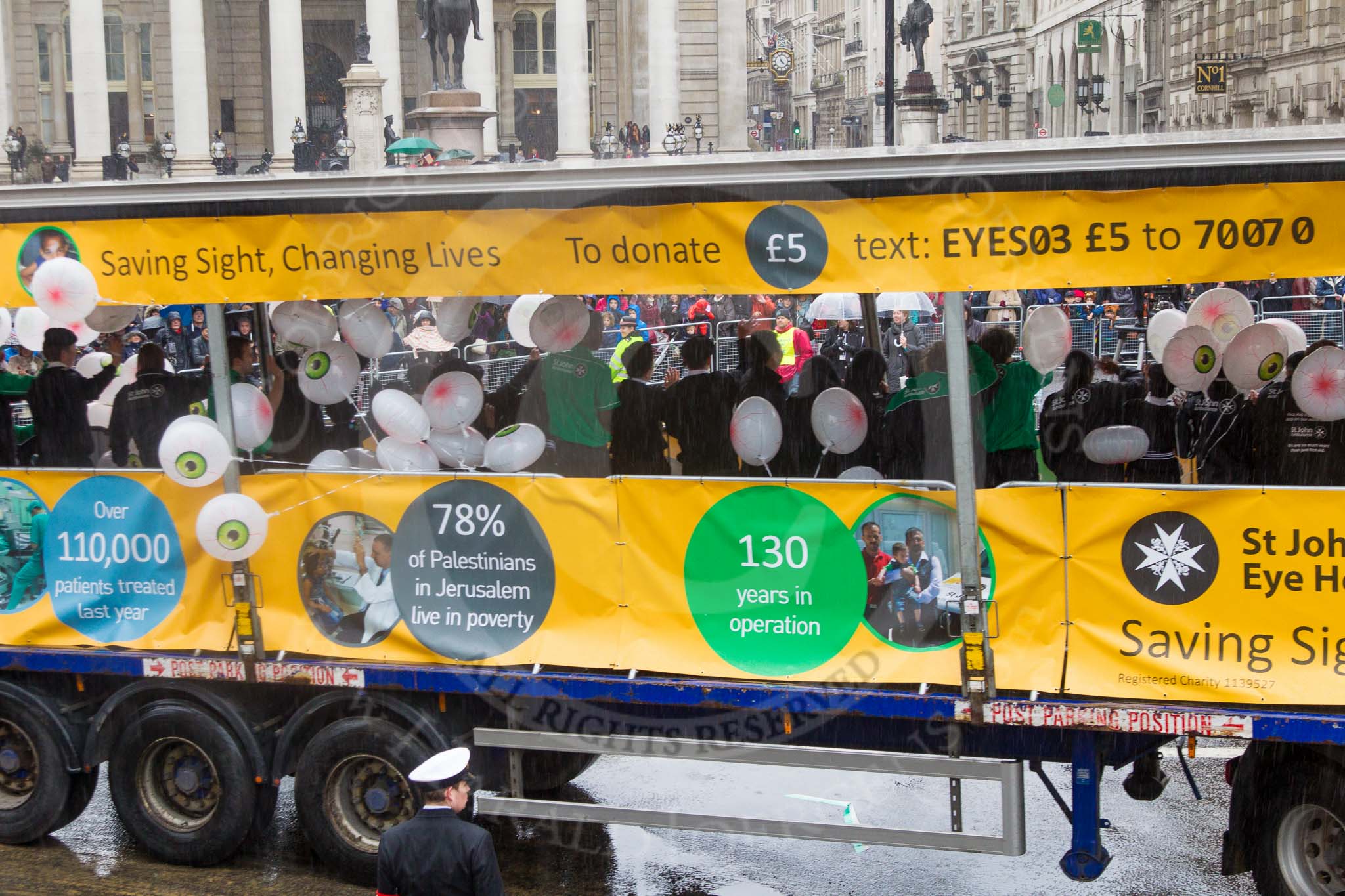 Lord Mayor's Show 2013: 43-St John Ambulance and St.John of Jerusalem Eye Hospital Group- who run hospital and clinics in Jerusalem, Hebron, the West Bank and Gaza..
Press stand opposite Mansion House, City of London,
London,
Greater London,
United Kingdom,
on 09 November 2013 at 11:23, image #543