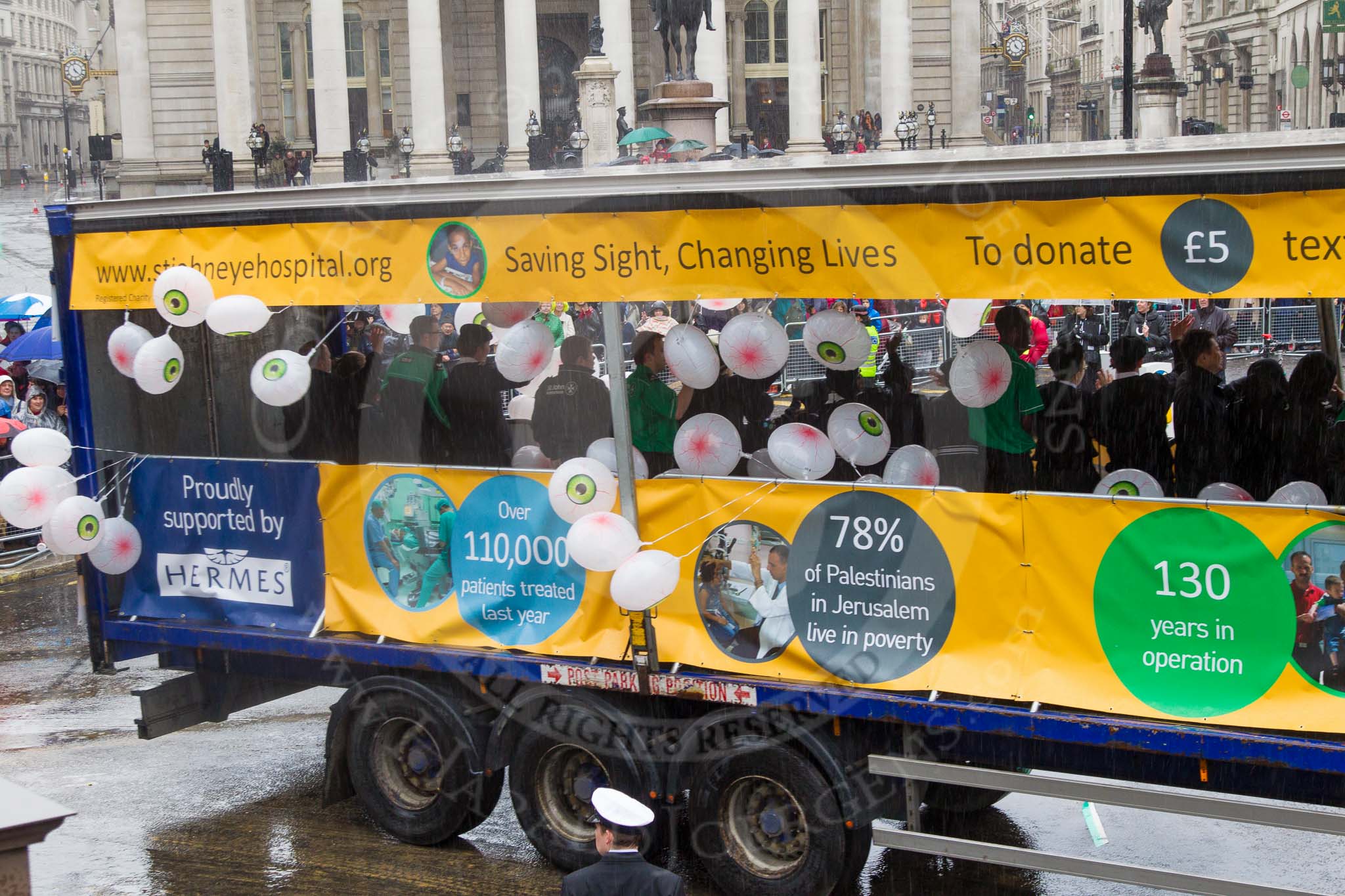 Lord Mayor's Show 2013: 43-St John Ambulance and St.John of Jerusalem Eye Hospital Group- who run hospital and clinics in Jerusalem, Hebron, the West Bank and Gaza..
Press stand opposite Mansion House, City of London,
London,
Greater London,
United Kingdom,
on 09 November 2013 at 11:23, image #544