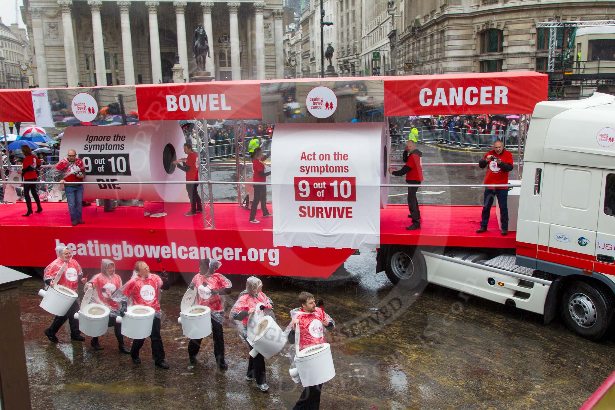 Lord Mayor's Show 2013: 50-Beating Bowel Cancer-are here to raise awareness and promote early diagnosis..
Press stand opposite Mansion House, City of London,
London,
Greater London,
United Kingdom,
on 09 November 2013 at 11:28, image #660