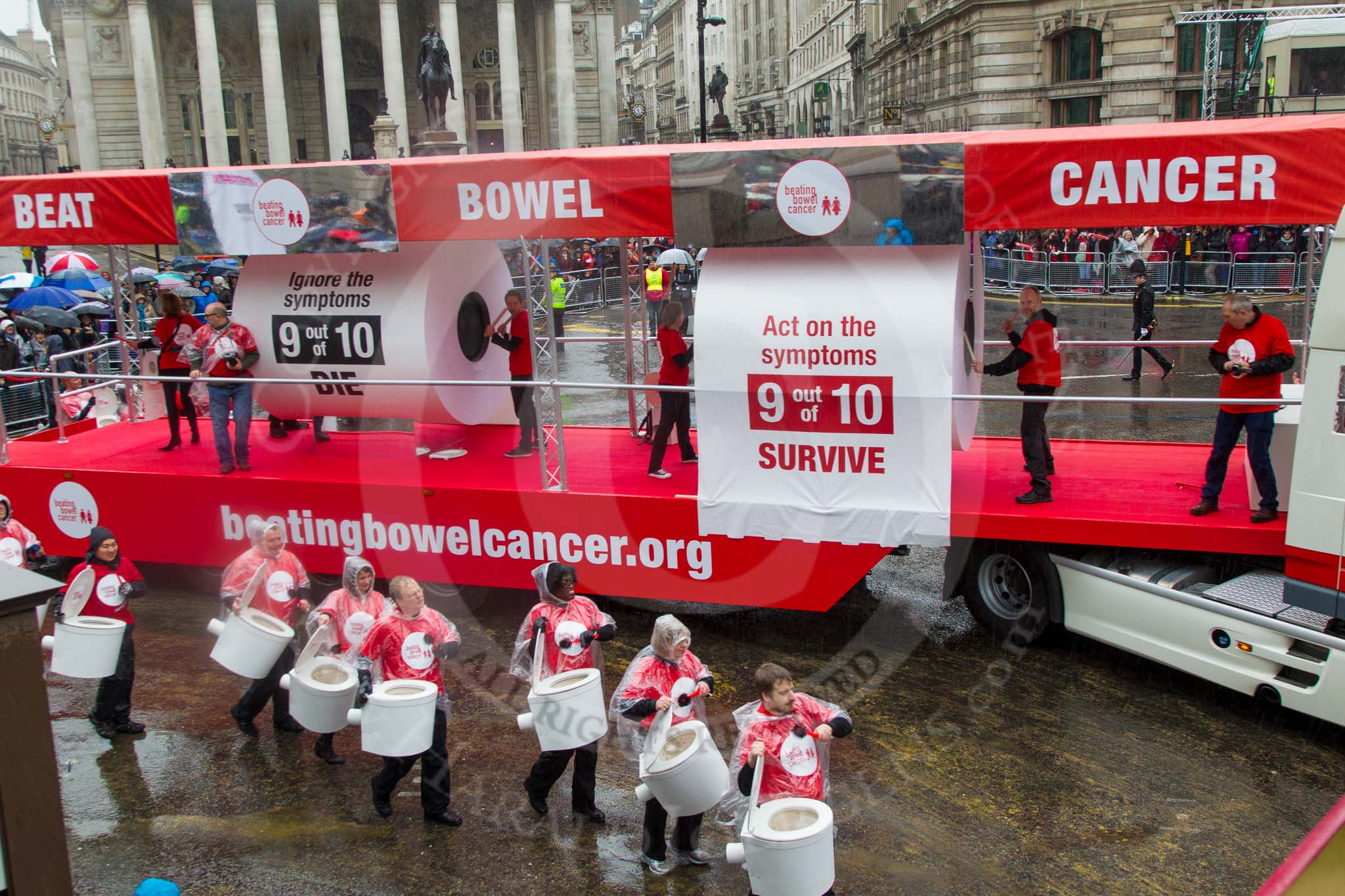 Lord Mayor's Show 2013: 50-Beating Bowel Cancer-are here to raise awareness and promote early diagnosis..
Press stand opposite Mansion House, City of London,
London,
Greater London,
United Kingdom,
on 09 November 2013 at 11:28, image #661