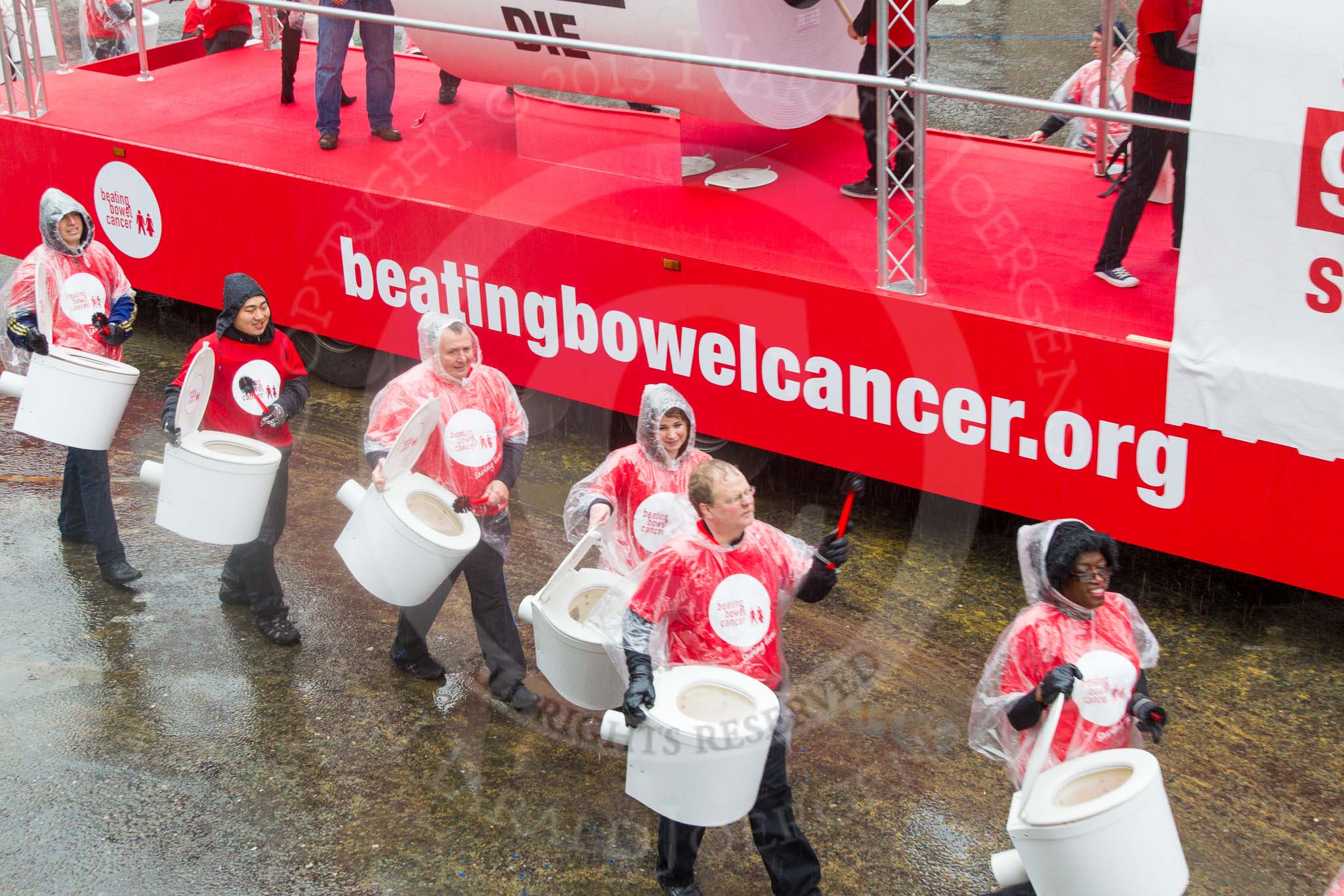 Lord Mayor's Show 2013: 50-Beating Bowel Cancer-are here to raise awareness and promote early diagnosis..
Press stand opposite Mansion House, City of London,
London,
Greater London,
United Kingdom,
on 09 November 2013 at 11:28, image #664