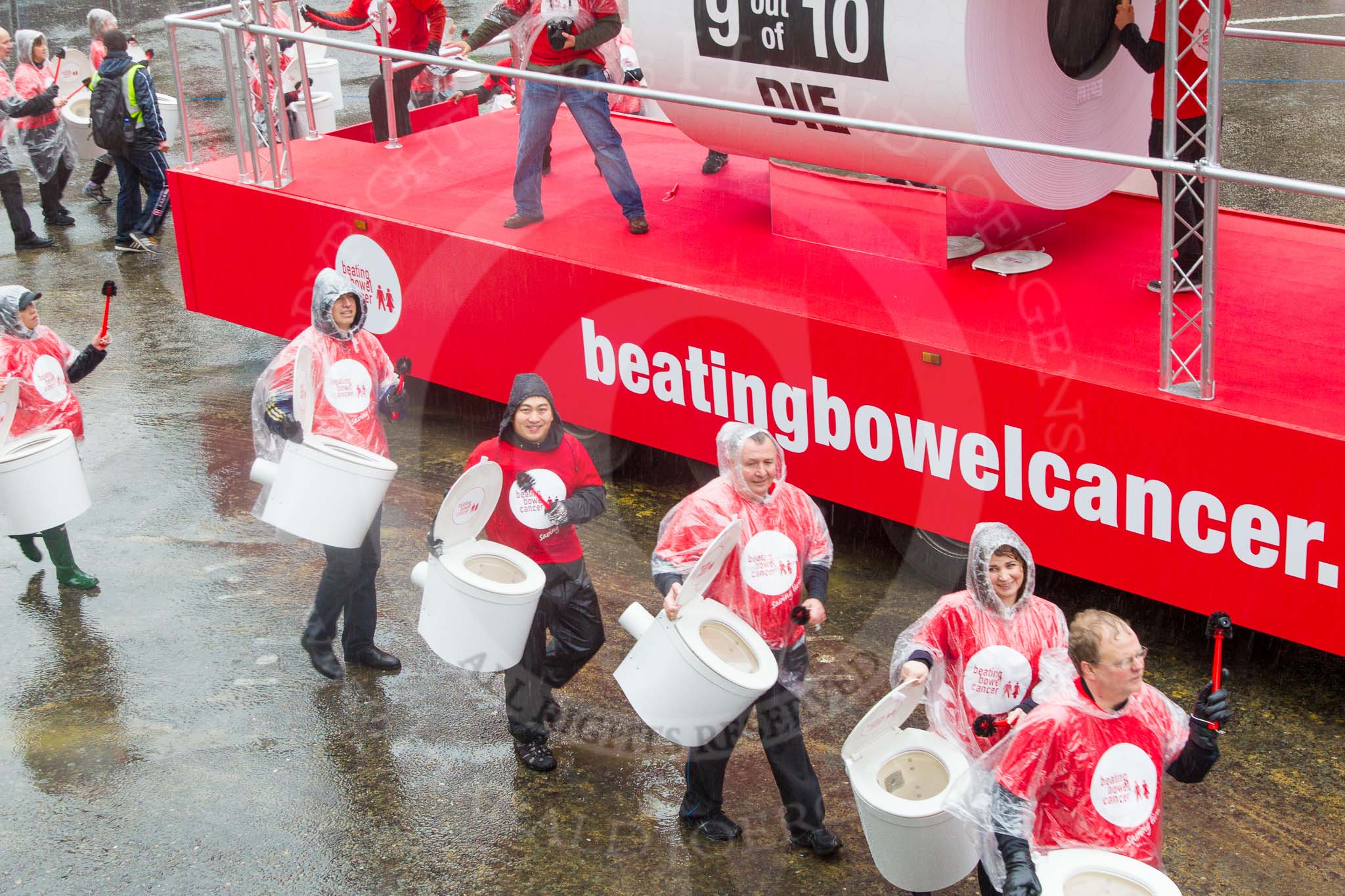 Lord Mayor's Show 2013: 50-Beating Bowel Cancer-are here to raise awareness and promote early diagnosis..
Press stand opposite Mansion House, City of London,
London,
Greater London,
United Kingdom,
on 09 November 2013 at 11:28, image #665