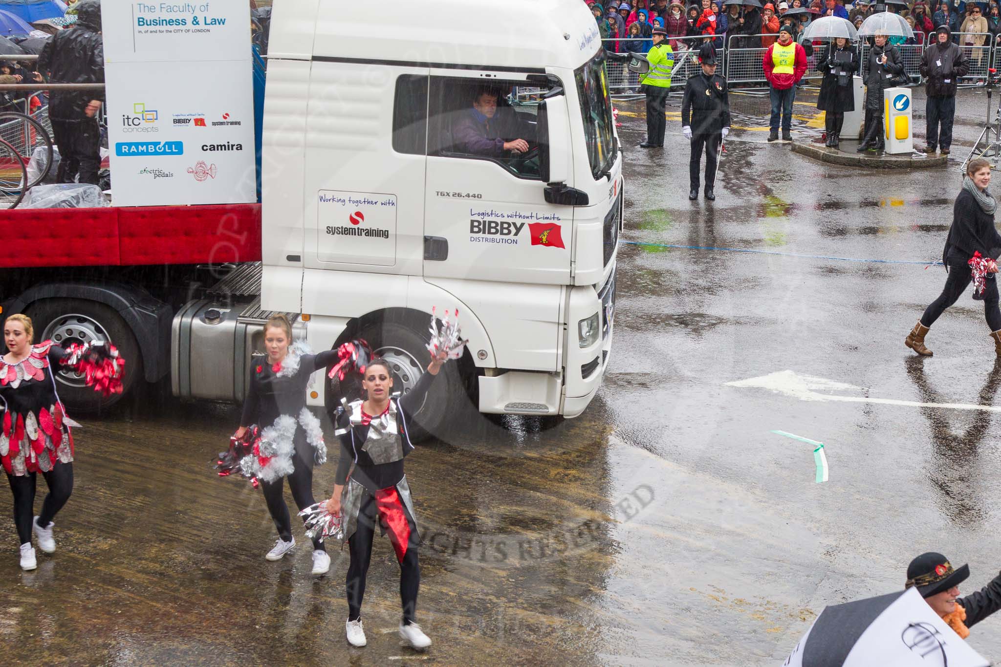 Lord Mayor's Show 2013: 54-London Metropolitan University-dynamic and multicultural institution which helps its students to build rewarding careers. Here they are presenting a heady mixture of architects, designers, lawyers and cheerleaders..
Press stand opposite Mansion House, City of London,
London,
Greater London,
United Kingdom,
on 09 November 2013 at 11:30, image #697