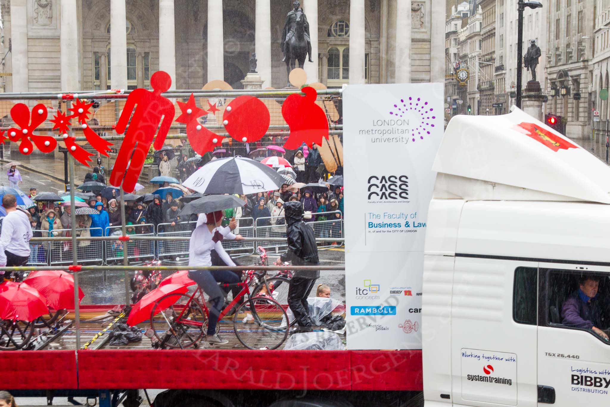 Lord Mayor's Show 2013: 54-London Metropolitan University-dynamic and multicultural institution which helps its students to build rewarding careers. Here they are presenting a heady mixture of architects, designers, lawyers and cheerleaders..
Press stand opposite Mansion House, City of London,
London,
Greater London,
United Kingdom,
on 09 November 2013 at 11:30, image #700