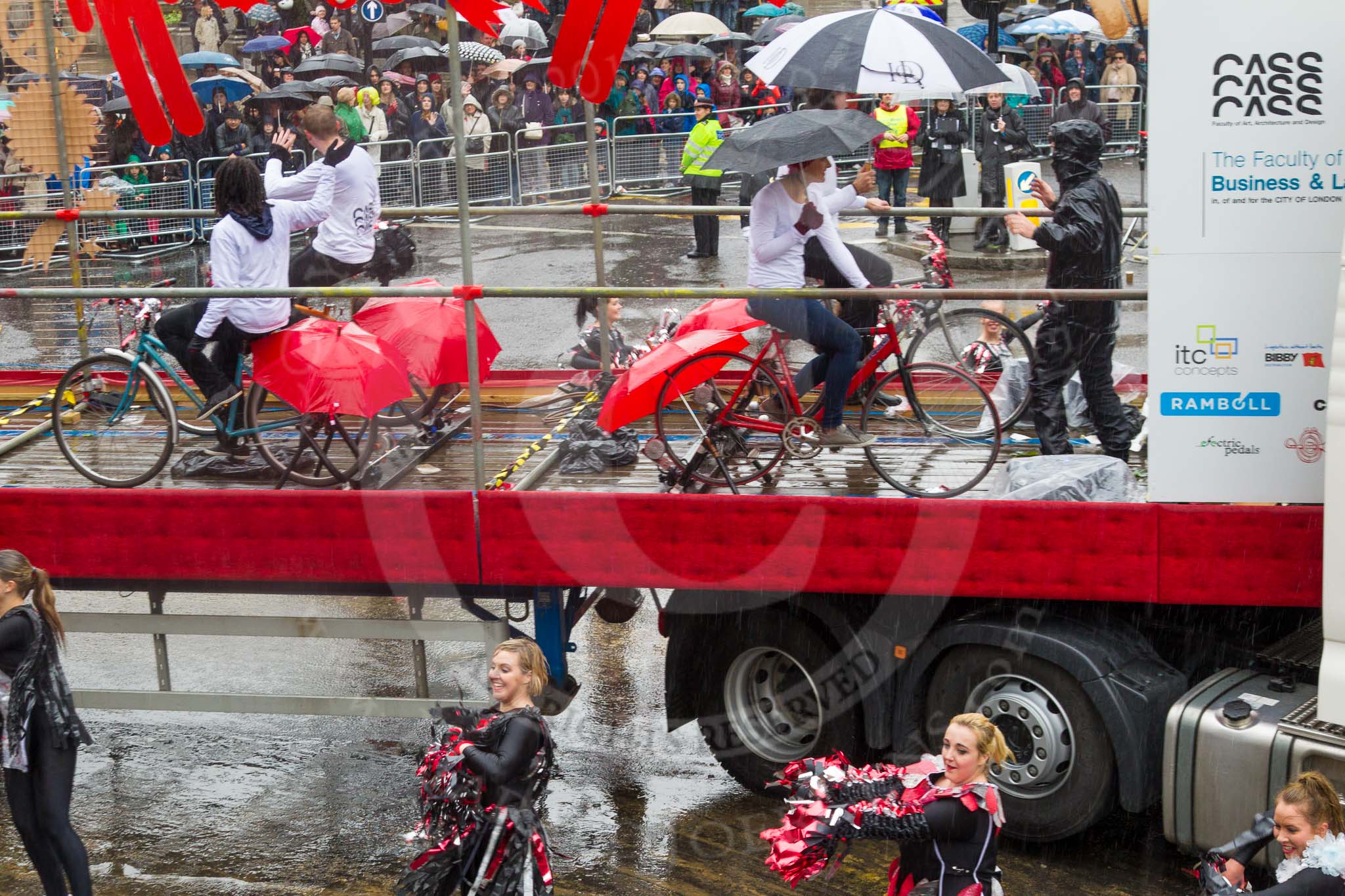 Lord Mayor's Show 2013: 54-London Metropolitan University-dynamic and multicultural institution which helps its students to build rewarding careers. Here they are presenting a heady mixture of architects, designers, lawyers and cheerleaders..
Press stand opposite Mansion House, City of London,
London,
Greater London,
United Kingdom,
on 09 November 2013 at 11:30, image #702