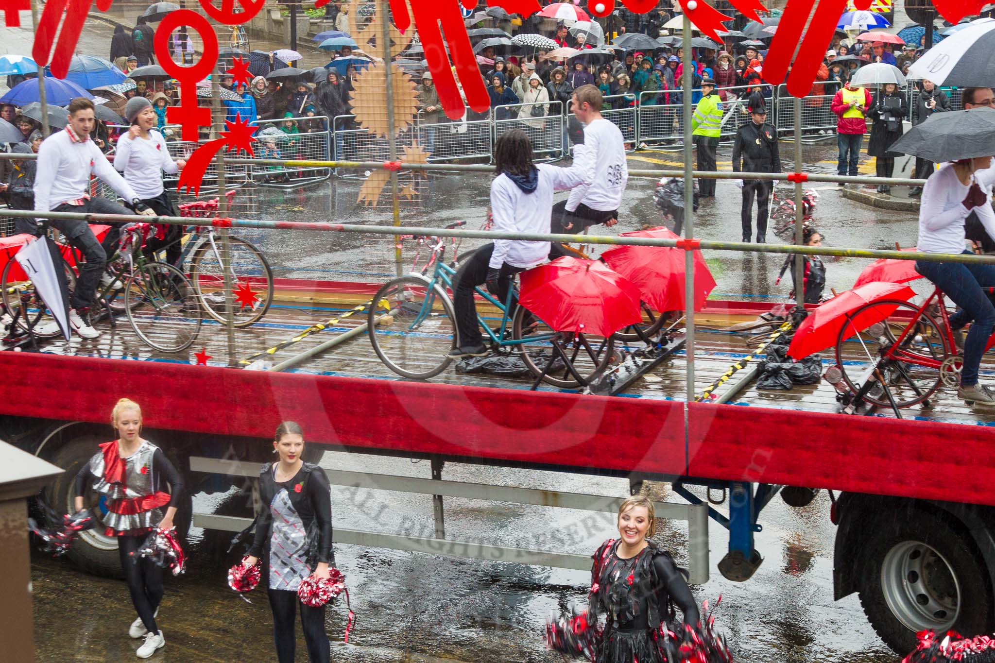 Lord Mayor's Show 2013: 54-London Metropolitan University-dynamic and multicultural institution which helps its students to build rewarding careers. Here they are presenting a heady mixture of architects, designers, lawyers and cheerleaders..
Press stand opposite Mansion House, City of London,
London,
Greater London,
United Kingdom,
on 09 November 2013 at 11:30, image #704