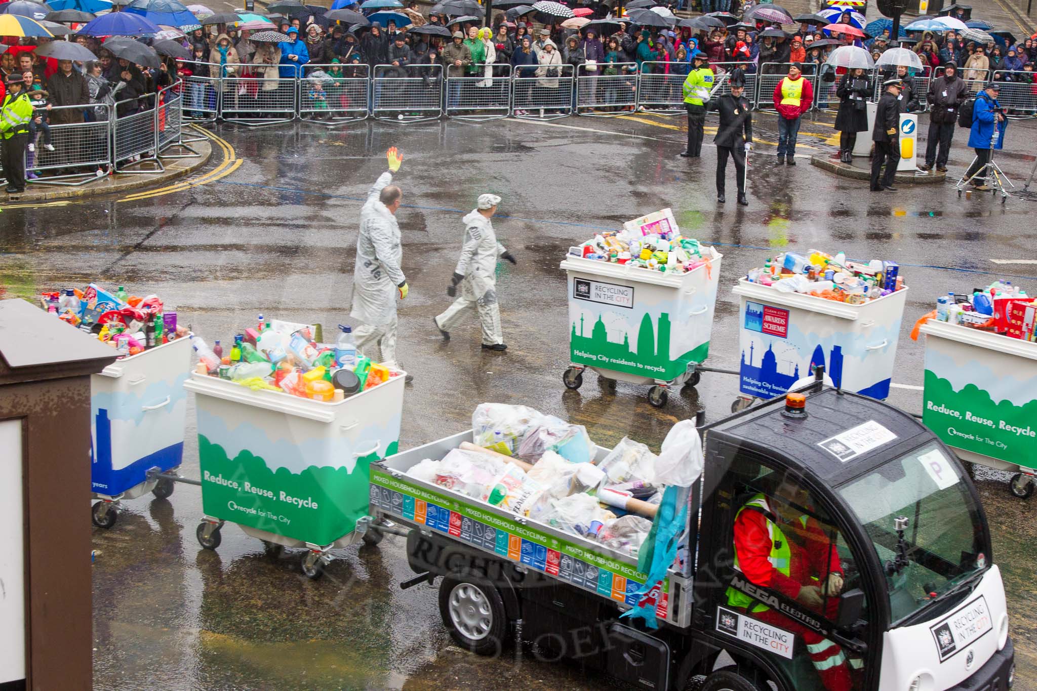 Lord Mayor's Show 2013: 59-Recycling in the City- The Binbot is joined again by his drumming street sweepers to celebrate 20th anniversary of the City's unique Clean City Awards scheme..
Press stand opposite Mansion House, City of London,
London,
Greater London,
United Kingdom,
on 09 November 2013 at 11:32, image #752