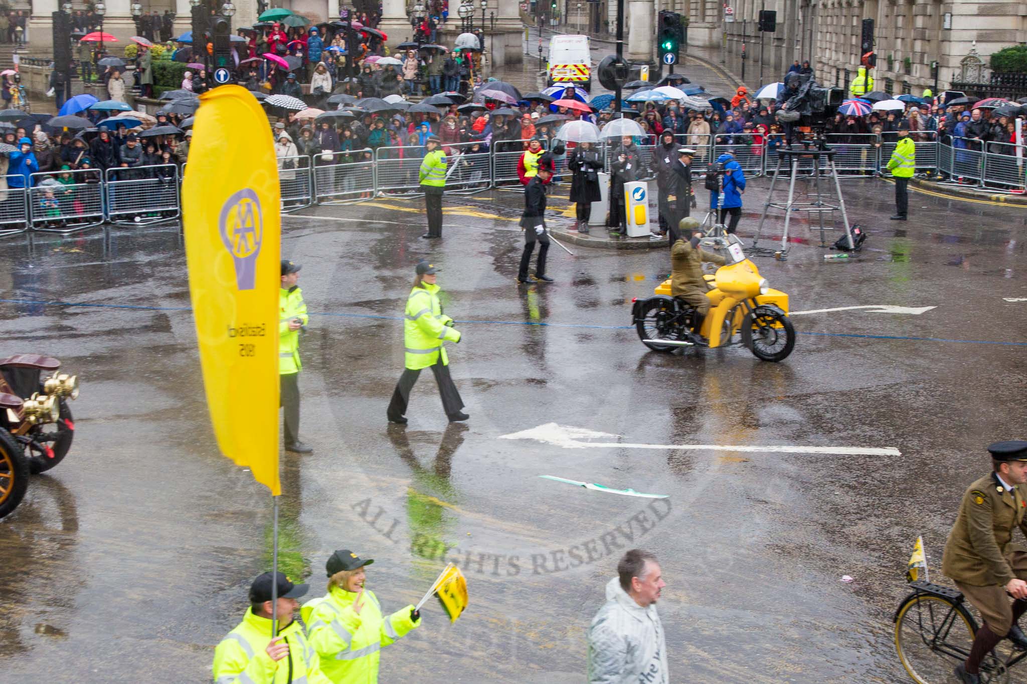 Lord Mayor's Show 2013: 60- The Automobile Association-AA1, the AA's 1904 Renault, and AA2 , a 1918 Chater-Lea motorcycle lead the AAs procession of historical amd modern patrol vehicles..
Press stand opposite Mansion House, City of London,
London,
Greater London,
United Kingdom,
on 09 November 2013 at 11:32, image #756