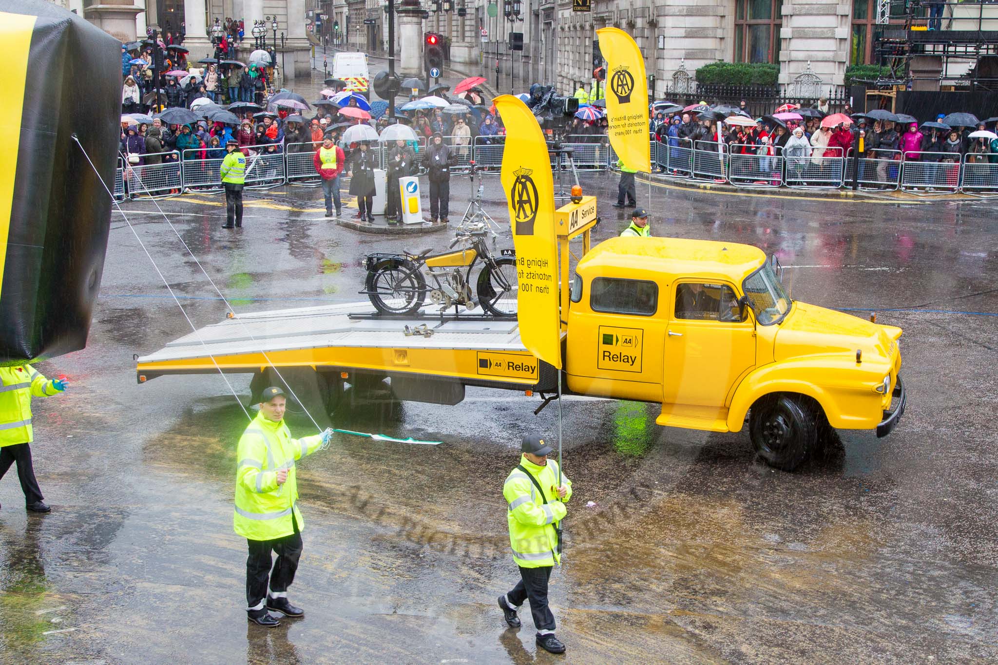 Lord Mayor's Show 2013: 60- The Automobile Association-AA1, the AA's 1904 Renault, and AA2 , a 1918 Chater-Lea motorcycle lead the AAs procession of historical amd modern patrol vehicles..
Press stand opposite Mansion House, City of London,
London,
Greater London,
United Kingdom,
on 09 November 2013 at 11:33, image #764